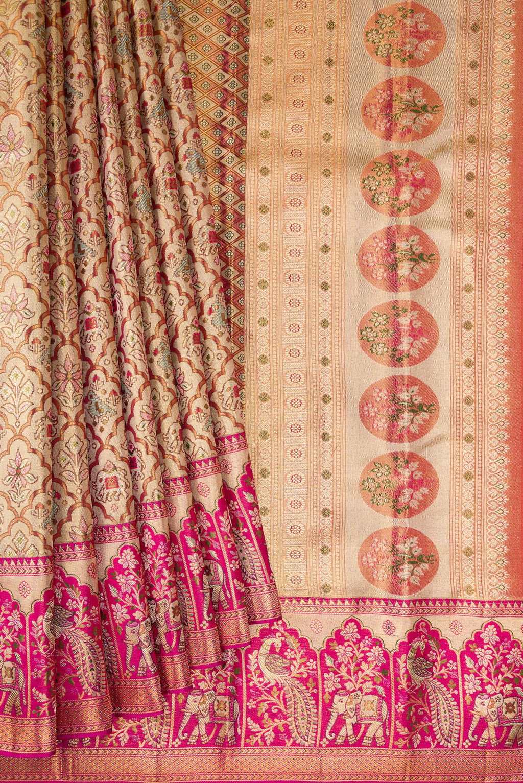 Pleats and pallu of Gold Dual Tone Kanjivaram Tissue Silk Saree with Zari Brocade on the body and Fancy Border. 