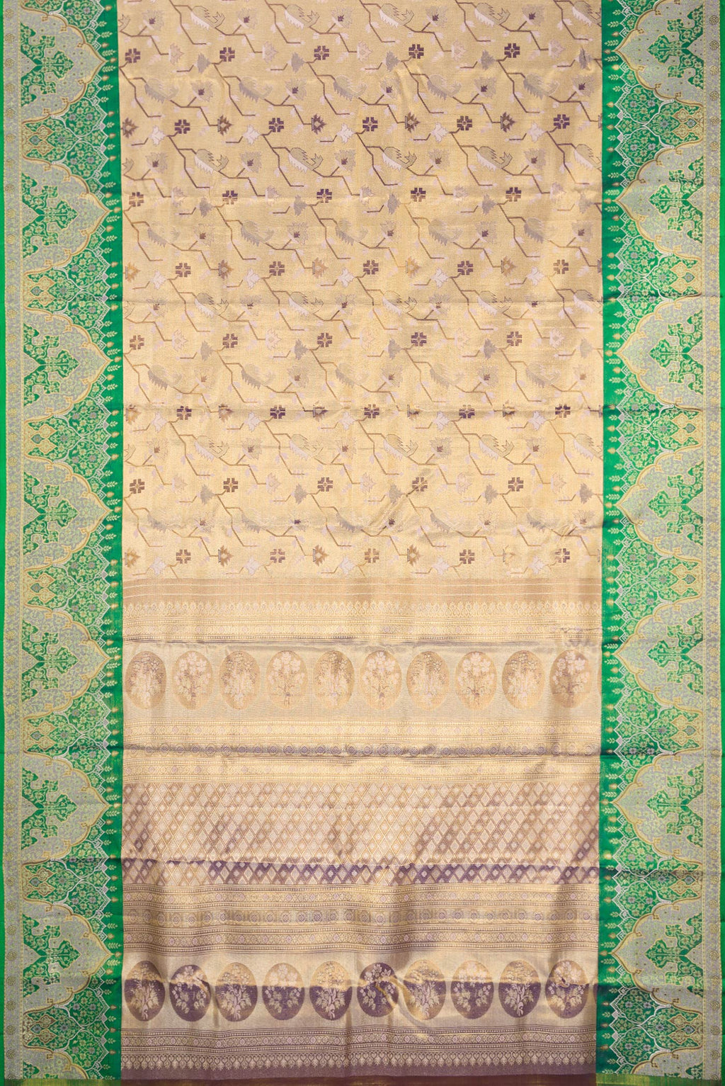Flat view of Gold Dual Tone Kanjivaram Tissue Silk Saree with Zari Brocade on the body and Fancy Border. 