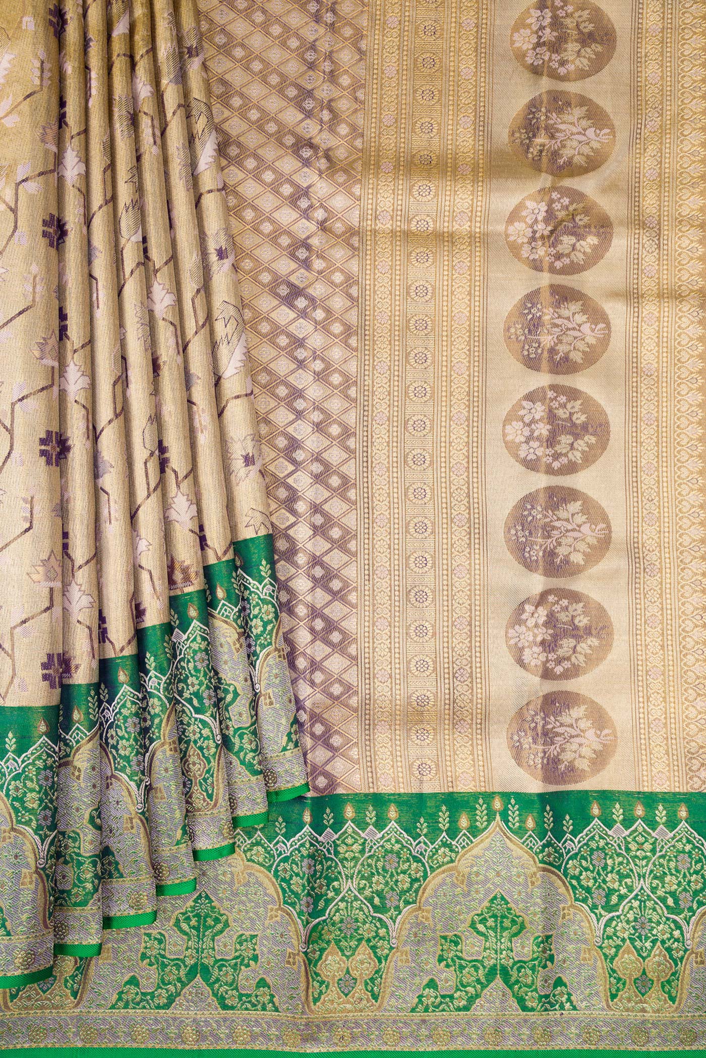 Pleats and pallu of Gold Dual Tone Kanjivaram Tissue Silk Saree with Zari Brocade on the body and Fancy Border. 