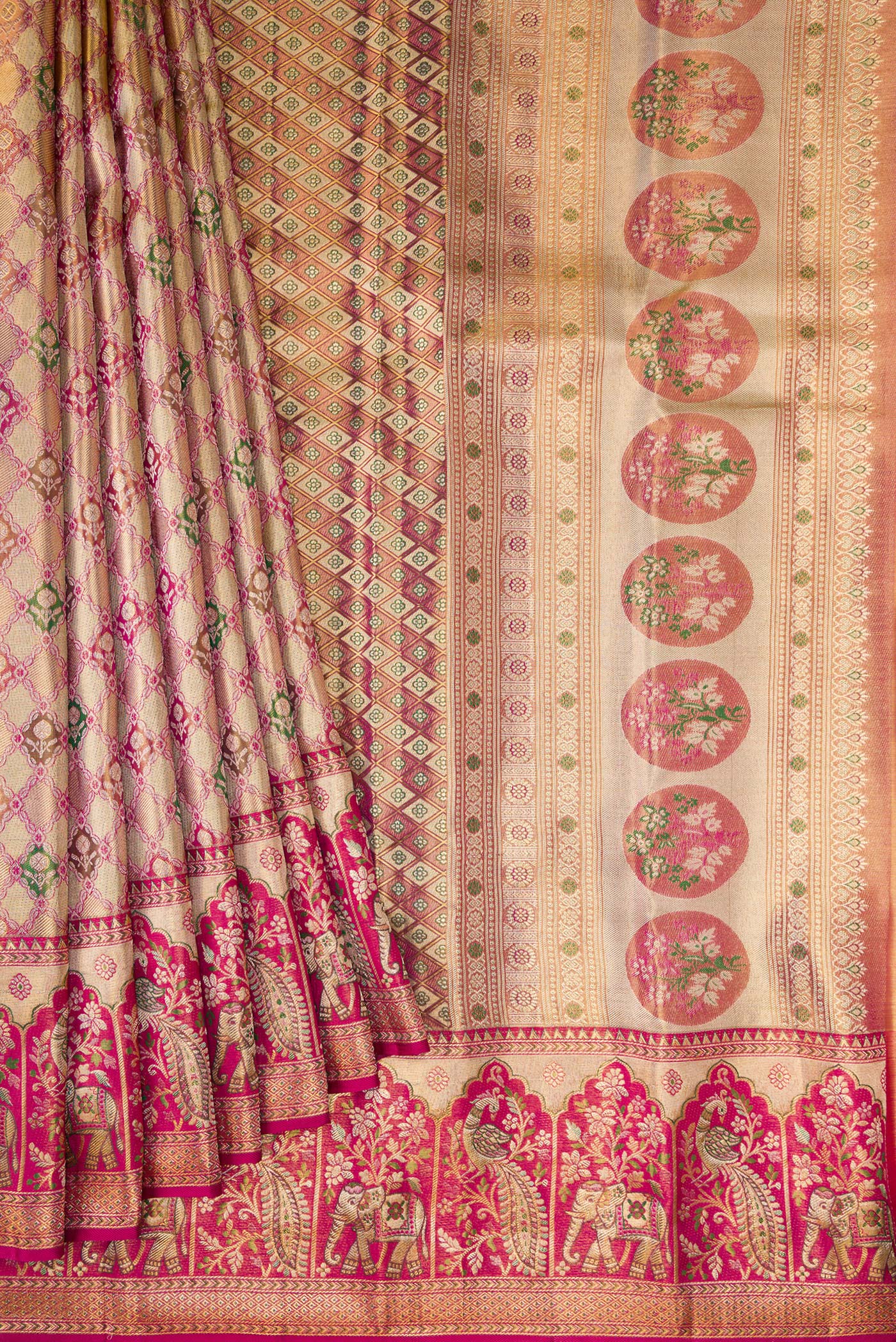 Pleats and pallu of Gold Dual Tone Kanjivaram Tissue Silk Saree with Zari Brocade on the body and Fancy Border. 
