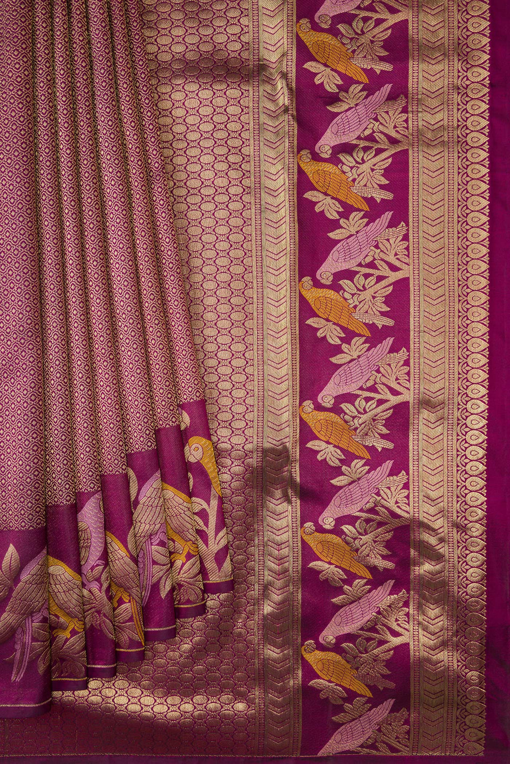 Pleats and pallu of Purple Kanjivaram Silk Saree with Zari Brocade on the body and Fancy Border. 