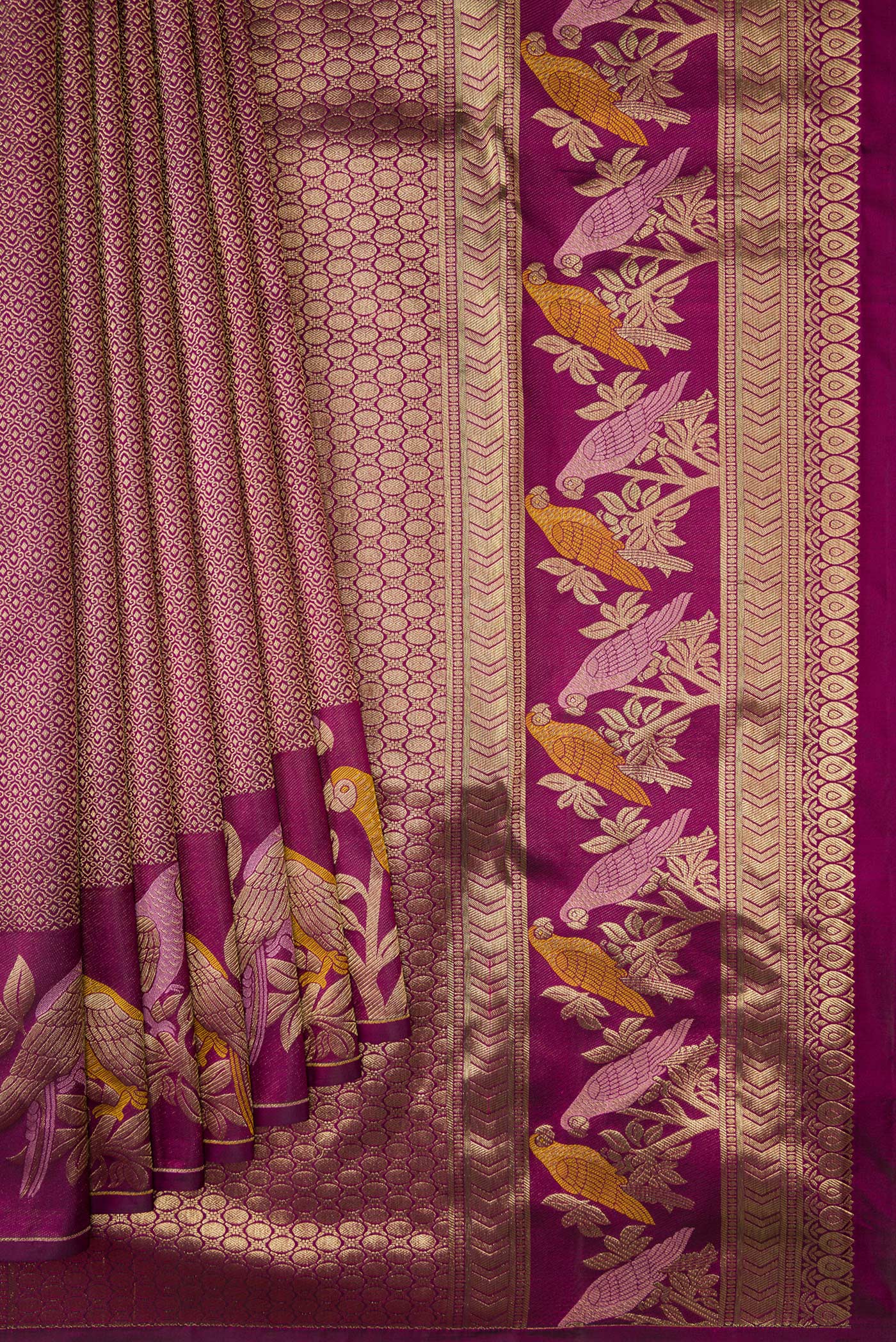 Pleats and pallu of Purple Kanjivaram Silk Saree with Zari Brocade on the body and Fancy Border. 