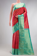 Dark Pink Kanjivaram Silk Saree with Zari Brocade on the body and Zari Border.  displayed on a mannequin