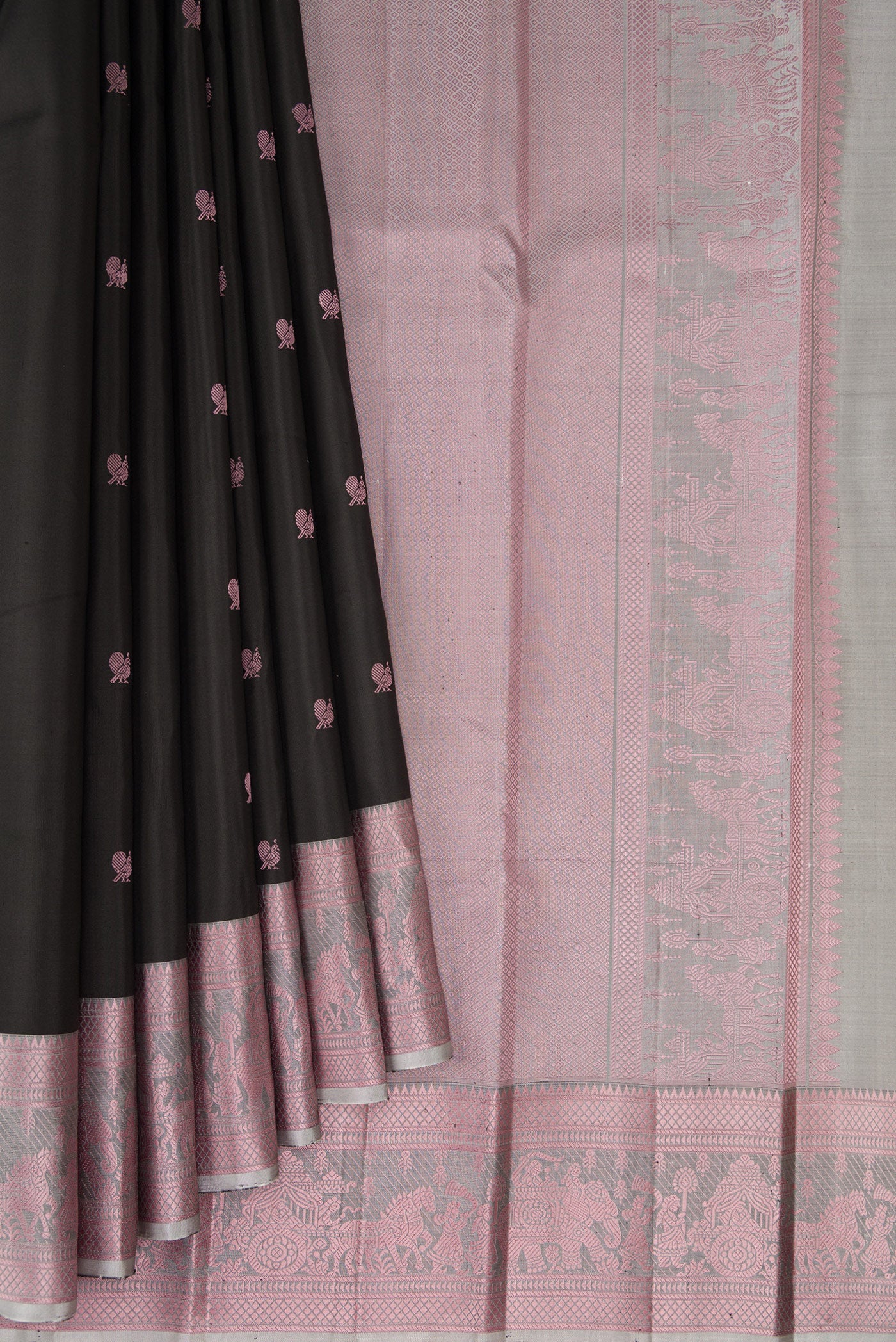 Pleats and pallu of Black Kanchipuram Silk Saree with Thread Butta on the body and Thread Border. 