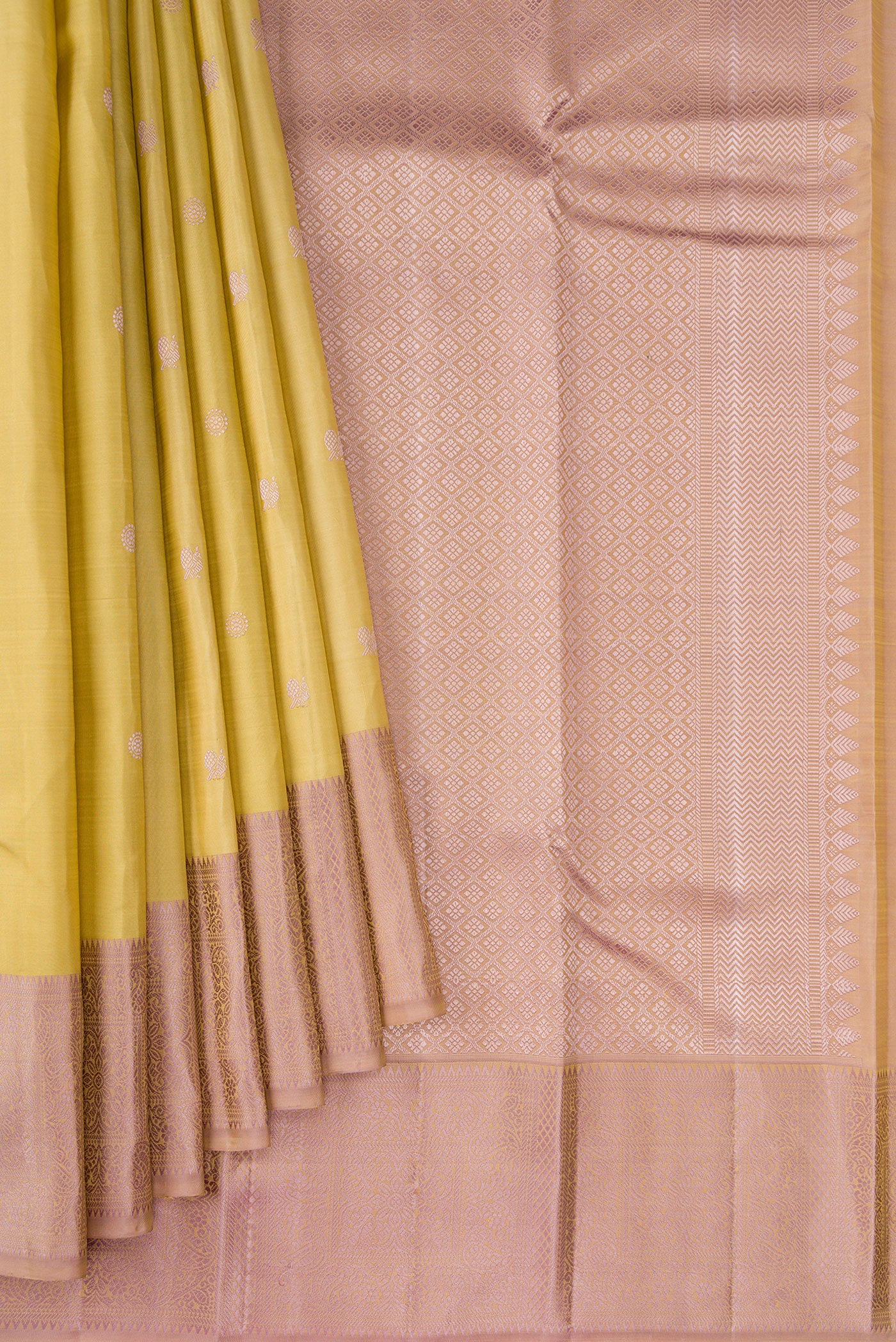 Pleats and pallu of Sandal Kanchipuram Silk Saree with Thread Butta on the body and Thread Border. 