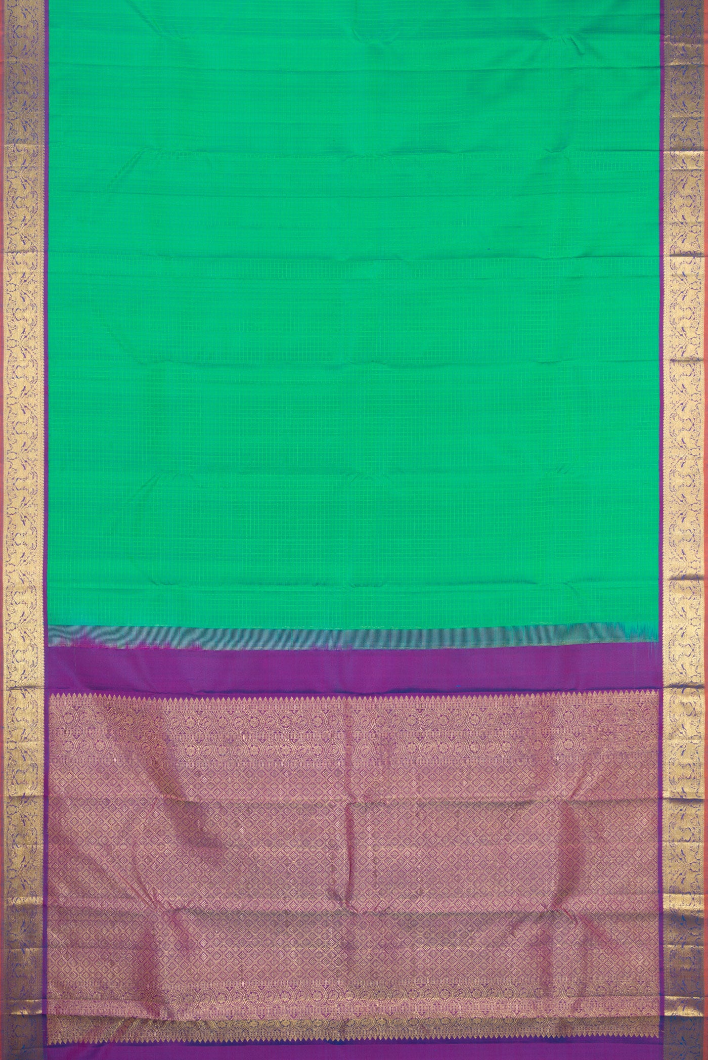 Flat view of Green Kanchipuram Silk Saree with Checked design on the body and Zari Border. 