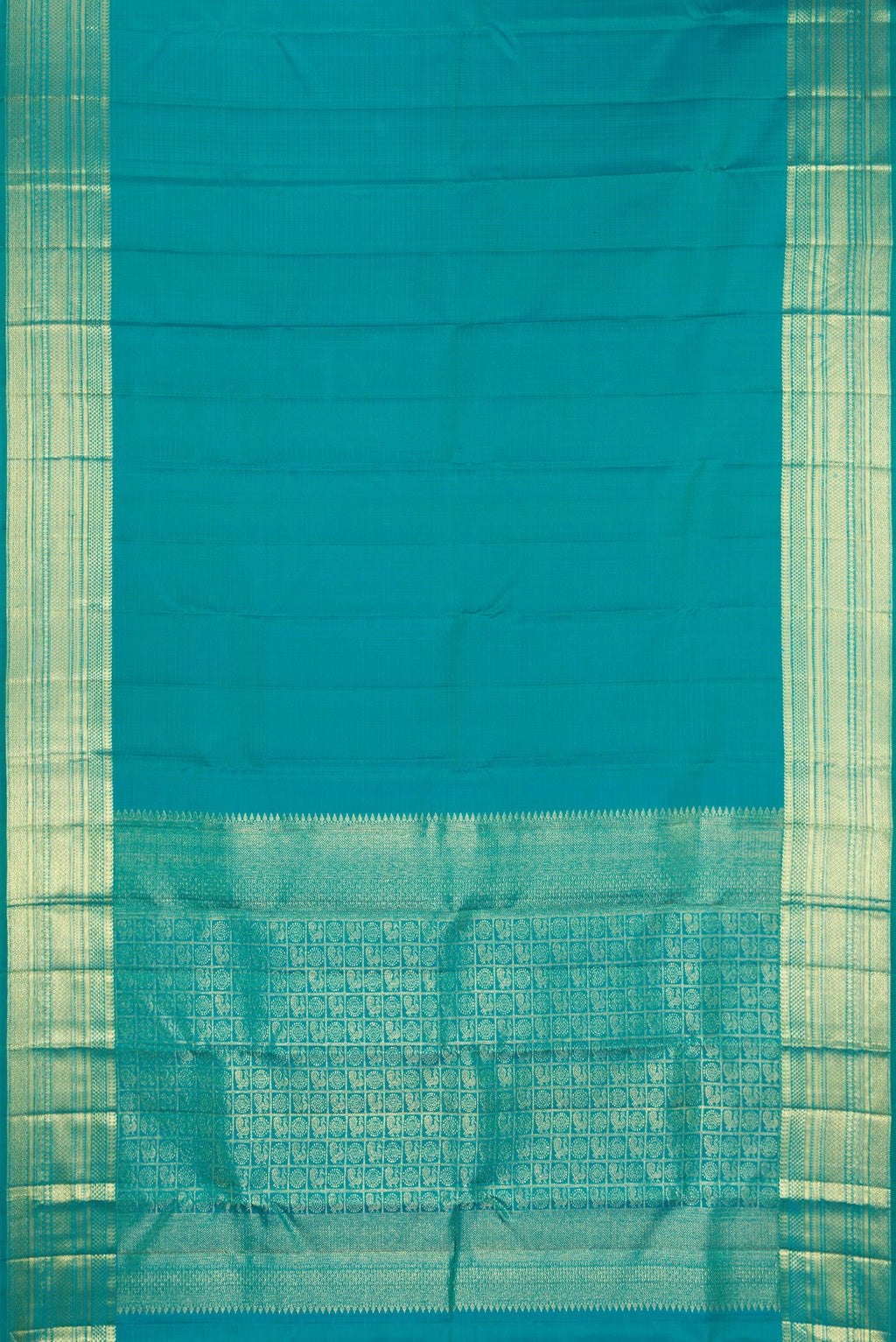 Flat view of Peacock Blue Dual Tone Kanchipuram Silk Saree with Checked design on the body and Zari Border. 