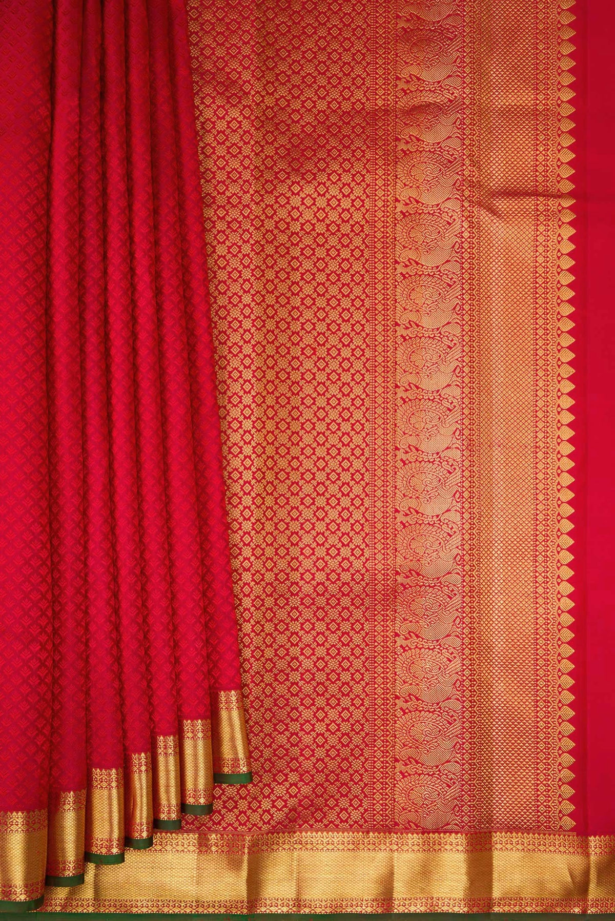 Pleats and pallu of Pure Silk Maroon Kanjivaram Saree with Jacquard design on the body and Zari Border. 