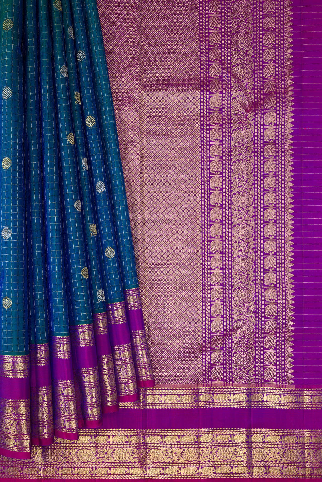 Pleats and pallu of Peacock Blue Dual Tone Kanjivaram Silk Saree with Checked design on the body and Fancy Border. 