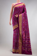 Purple Double Ikat Saree with Pure Ikat on the body and Ikat Border.  displayed on a mannequin