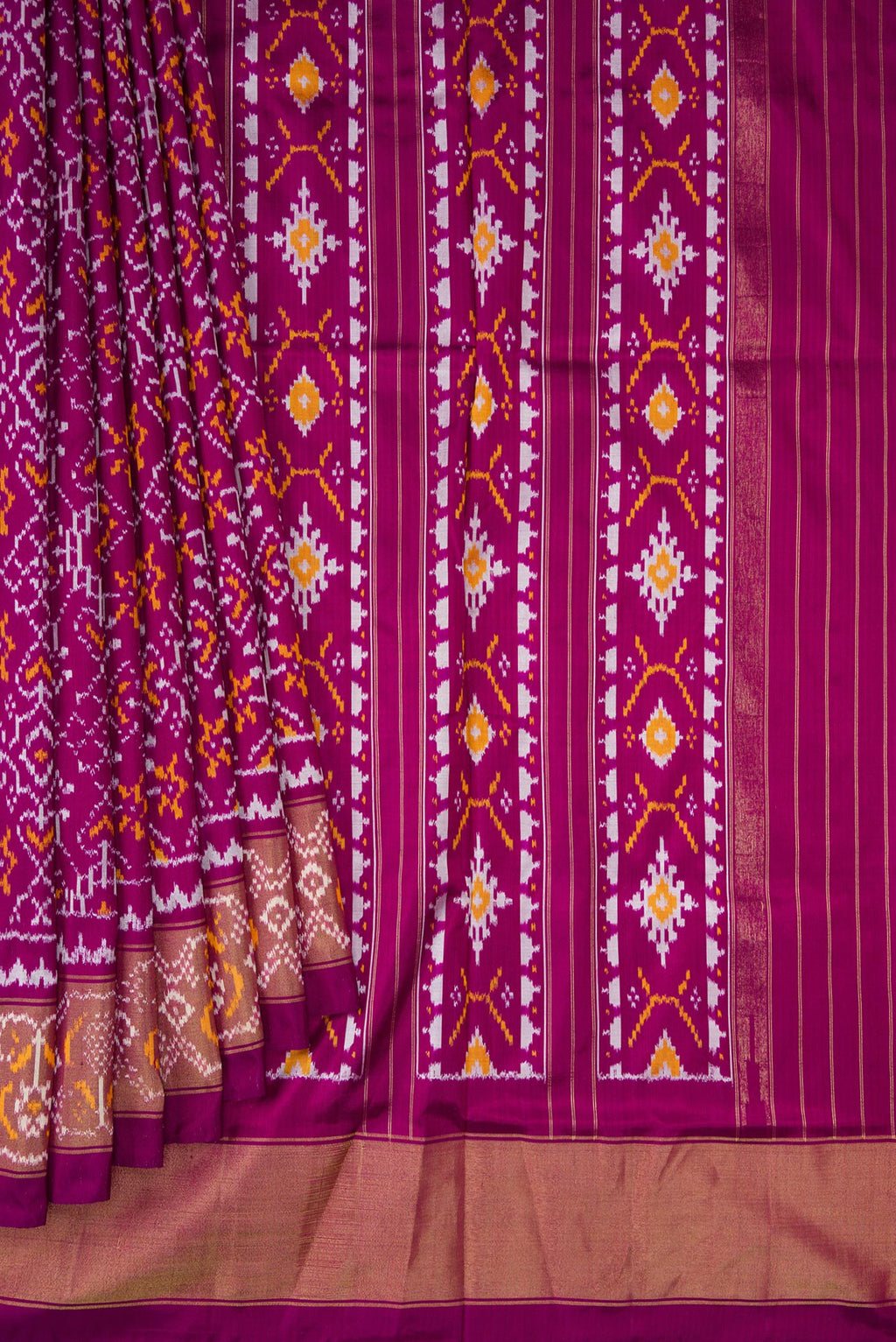 Pleats and pallu of Purple Double Ikat Saree with Pure Ikat on the body and Ikat Border. 
