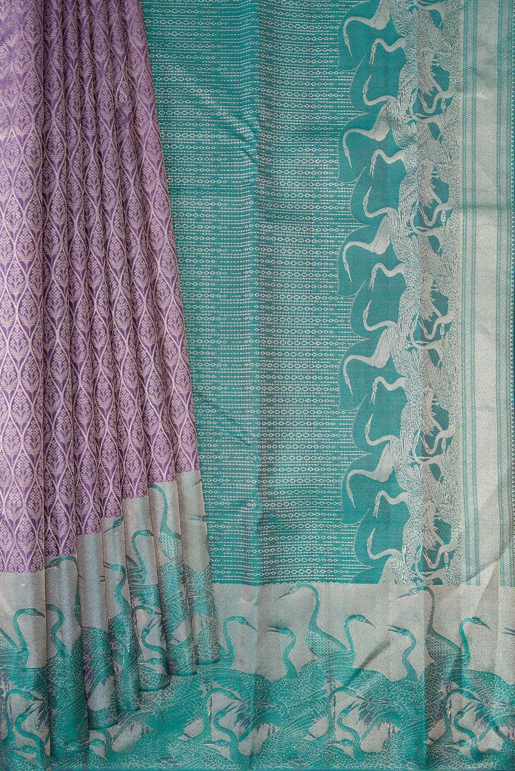 Pleats and pallu of Lavender Dual Tone Kanchipuram Tissue Silk Saree with Zari Brocade on the body and Fancy Border. 