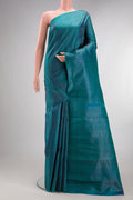 Pure Silk Peacock Blue Kanjivaram Saree with Zari Brocade on the body and Zari Border.  displayed on a mannequin