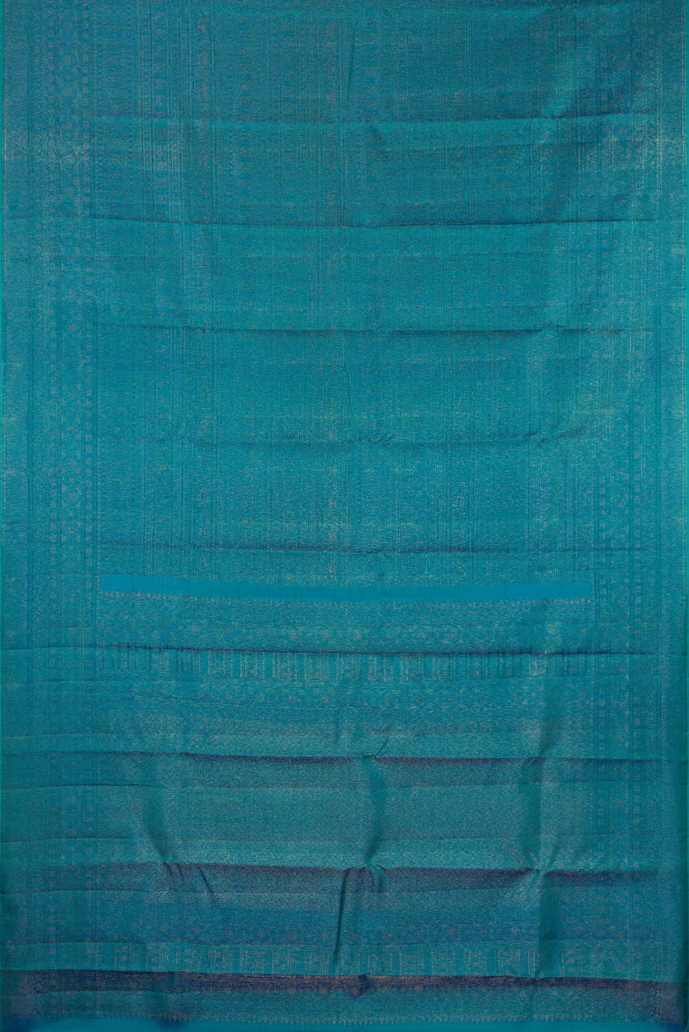 Flat view of Pure Silk Peacock Blue Kanjivaram Saree with Zari Brocade on the body and Zari Border. 