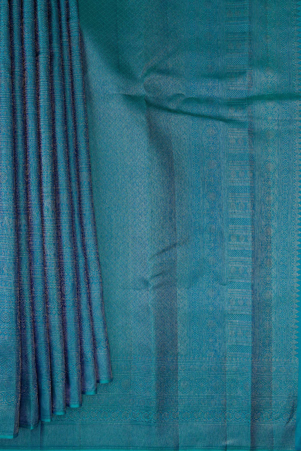 Pleats and pallu of Pure Silk Peacock Blue Kanjivaram Saree with Zari Brocade on the body and Zari Border. 