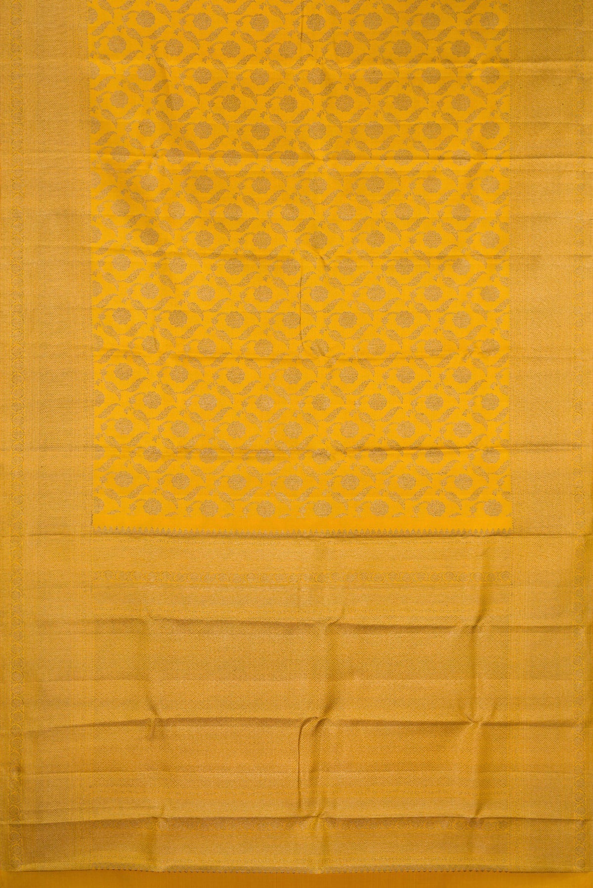 Flat view of Pure Silk Mustard Kanjivaram Saree with Zari Brocade on the body and Fancy Border. 