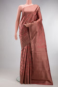 Coral Kanjivaram Silk Saree with Jacquard design on the body and Fancy Border.  displayed on a mannequin