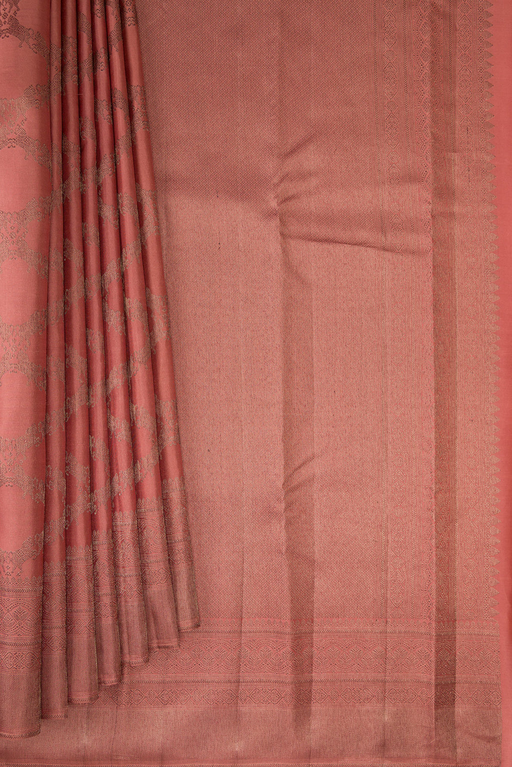 Pleats and pallu of Coral Kanjivaram Silk Saree with Jacquard design on the body and Fancy Border. 