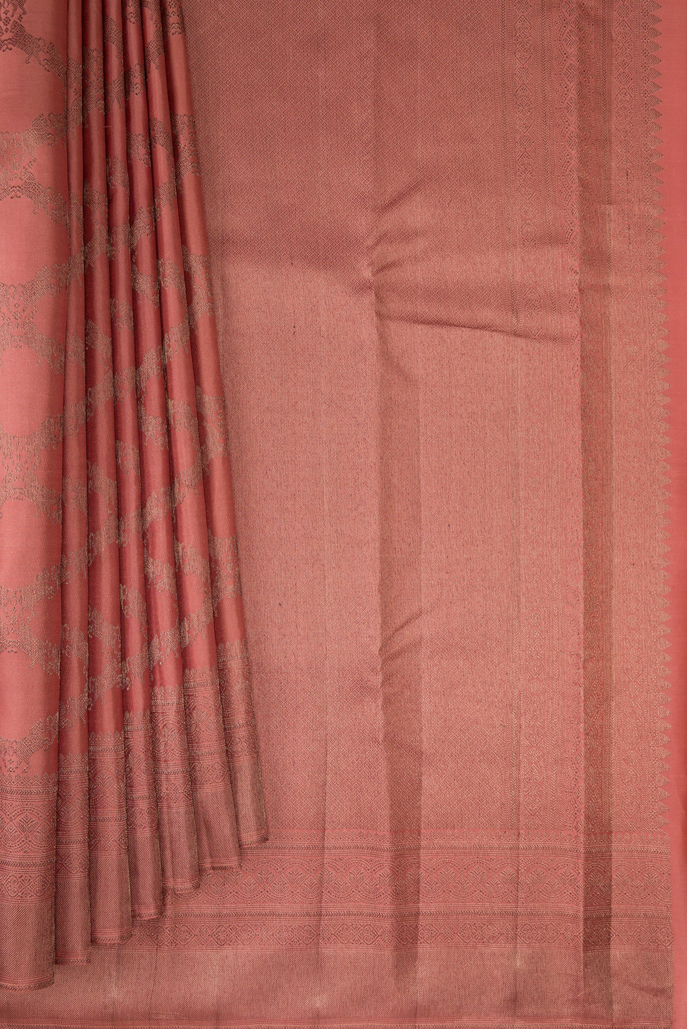 Pleats and pallu of Coral Kanjivaram Silk Saree with Jacquard design on the body and Fancy Border. 