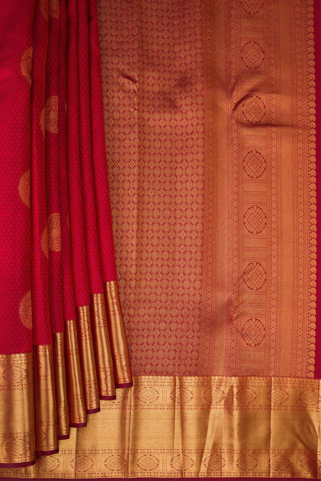Pleats and pallu of Maroon Kanjivaram Silk Saree with Jacquard With Zari Butta on the body and Zari Border. 