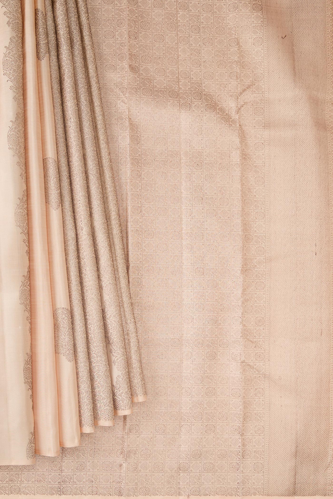 Pleats and pallu of Sandal Kanjivaram Silk Saree with Zari Butta on the body and Without Border. 