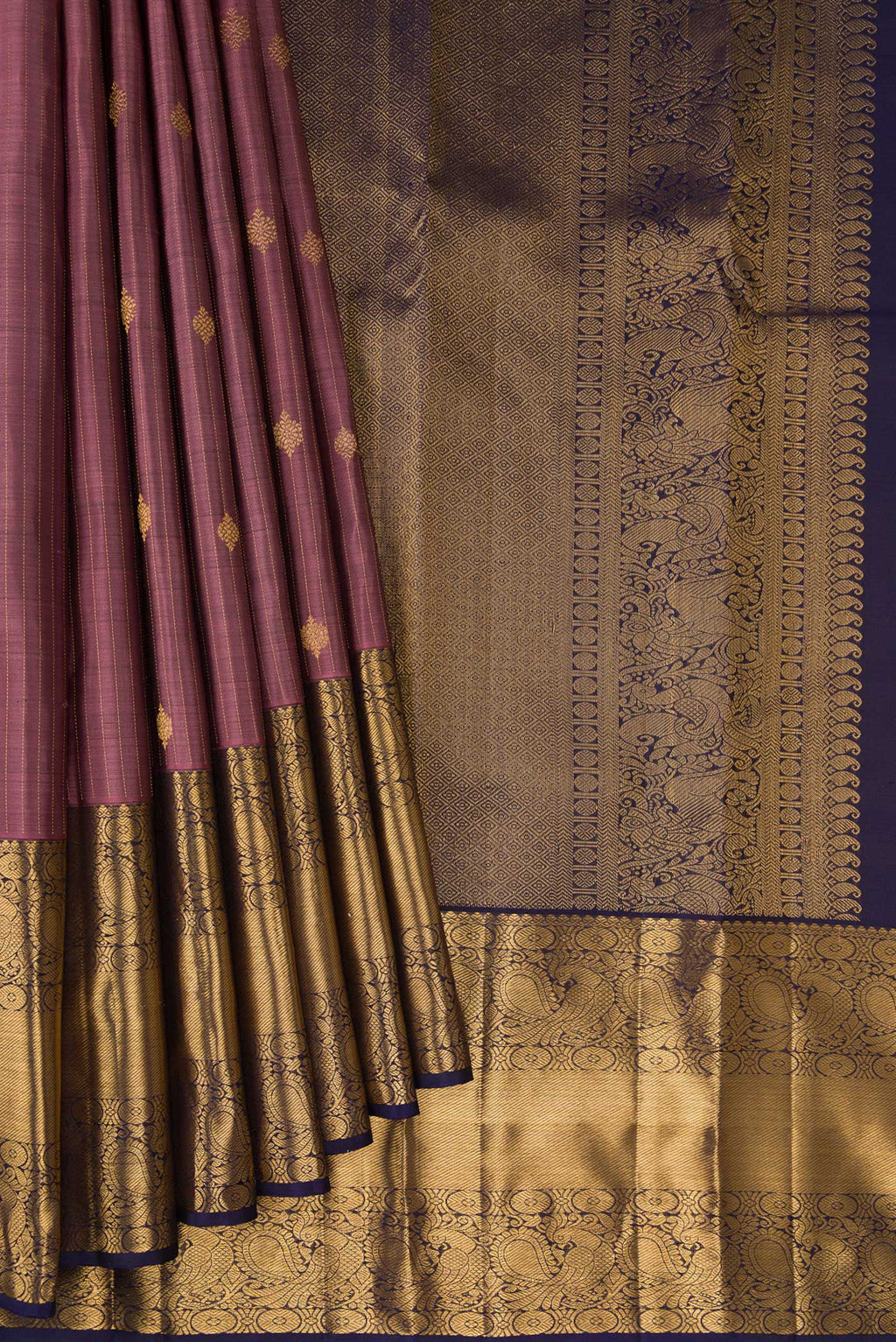 Pleats and pallu of Pink Dual Tone Kanjivaram Silk Saree with Stripes on the body and Zari Border. 
