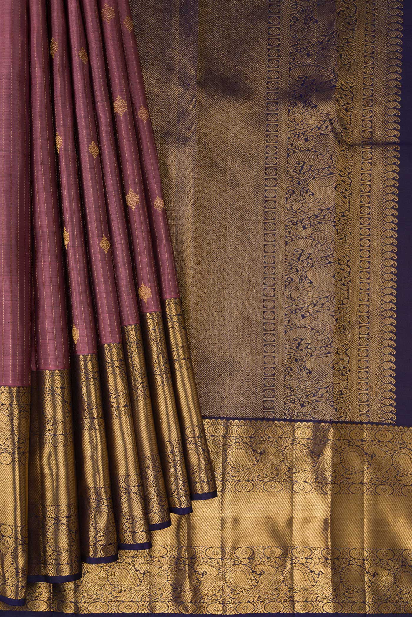 Pleats and pallu of Pink Dual Tone Kanjivaram Silk Saree with Stripes on the body and Zari Border. 