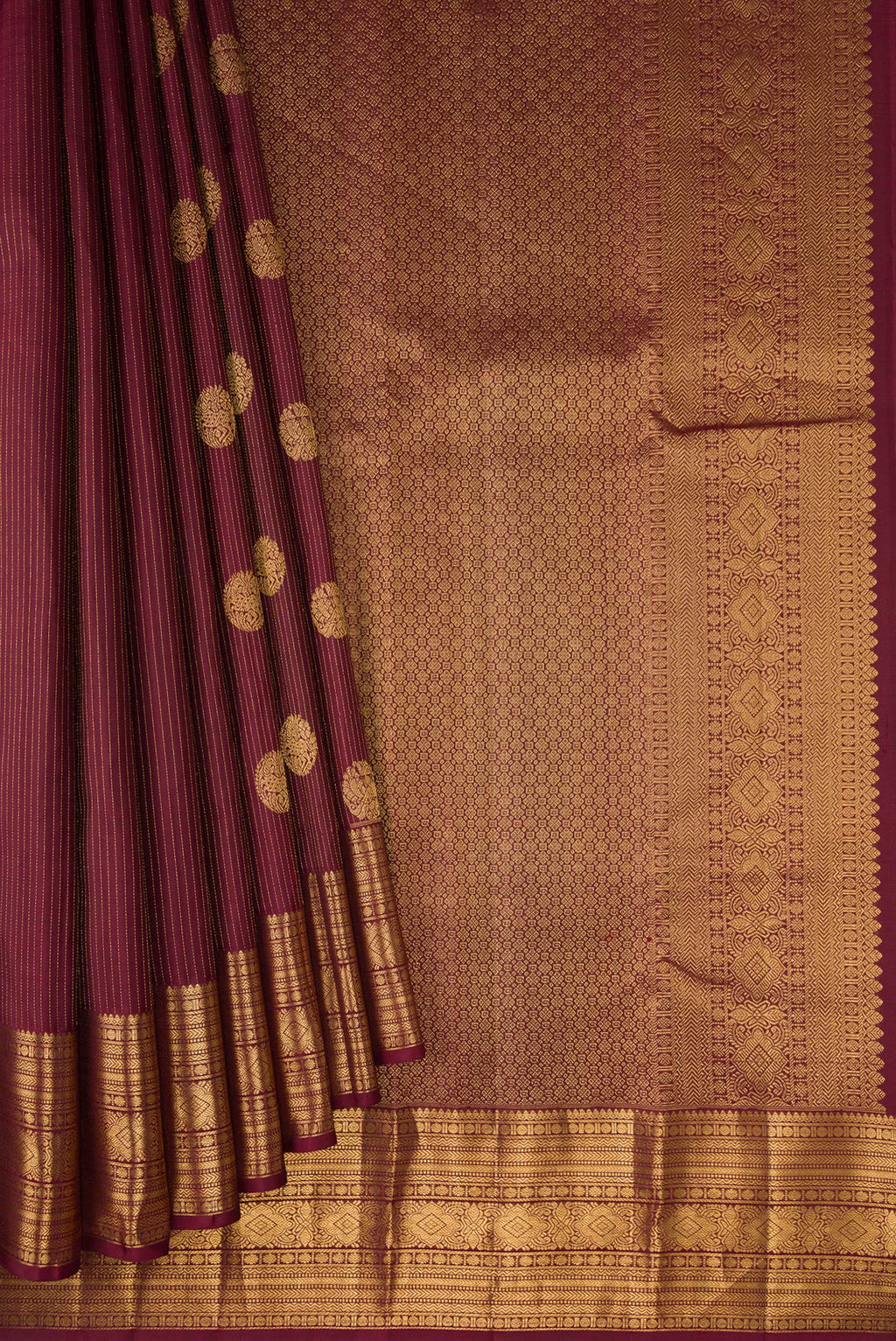 Pleats and pallu of Coffee Brown Kanjivaram Silk Saree with Stripes on the body and Zari Border. 