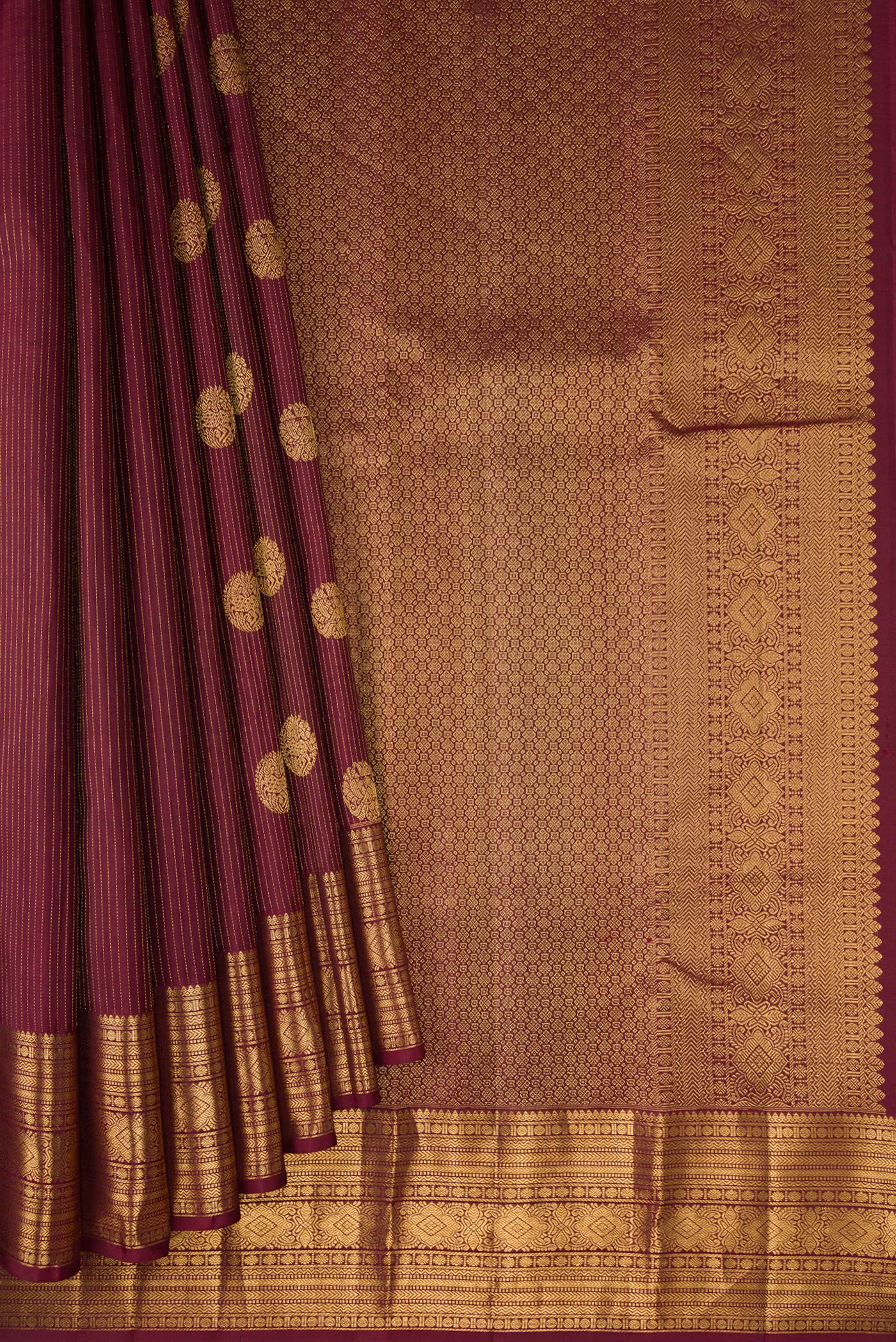 Pleats and pallu of Coffee Brown Kanjivaram Silk Saree with Stripes on the body and Zari Border. 
