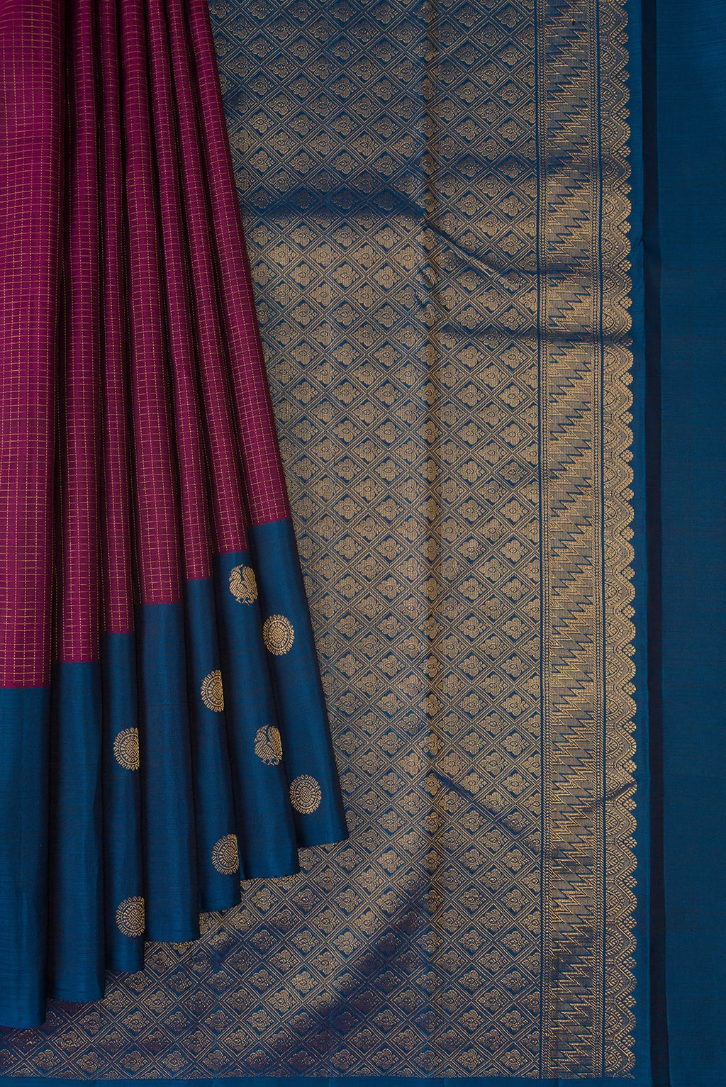 Pleats and pallu of Magenta Kanjivaram Silk Saree with Checked design on the body and Fancy Border. 