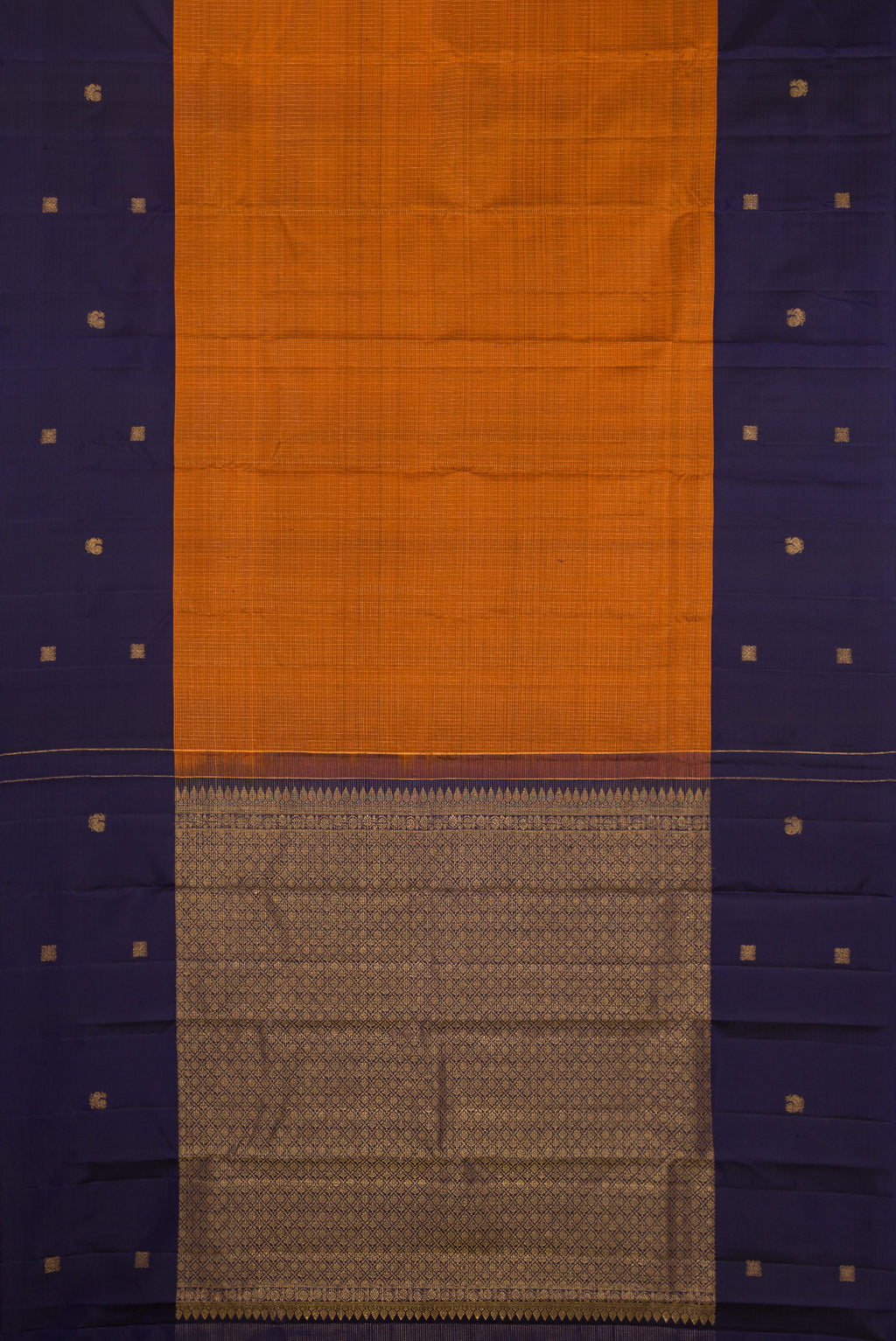 Flat view of Rust Kanjivaram Silk Saree with Checked design on the body and Fancy Border. 
