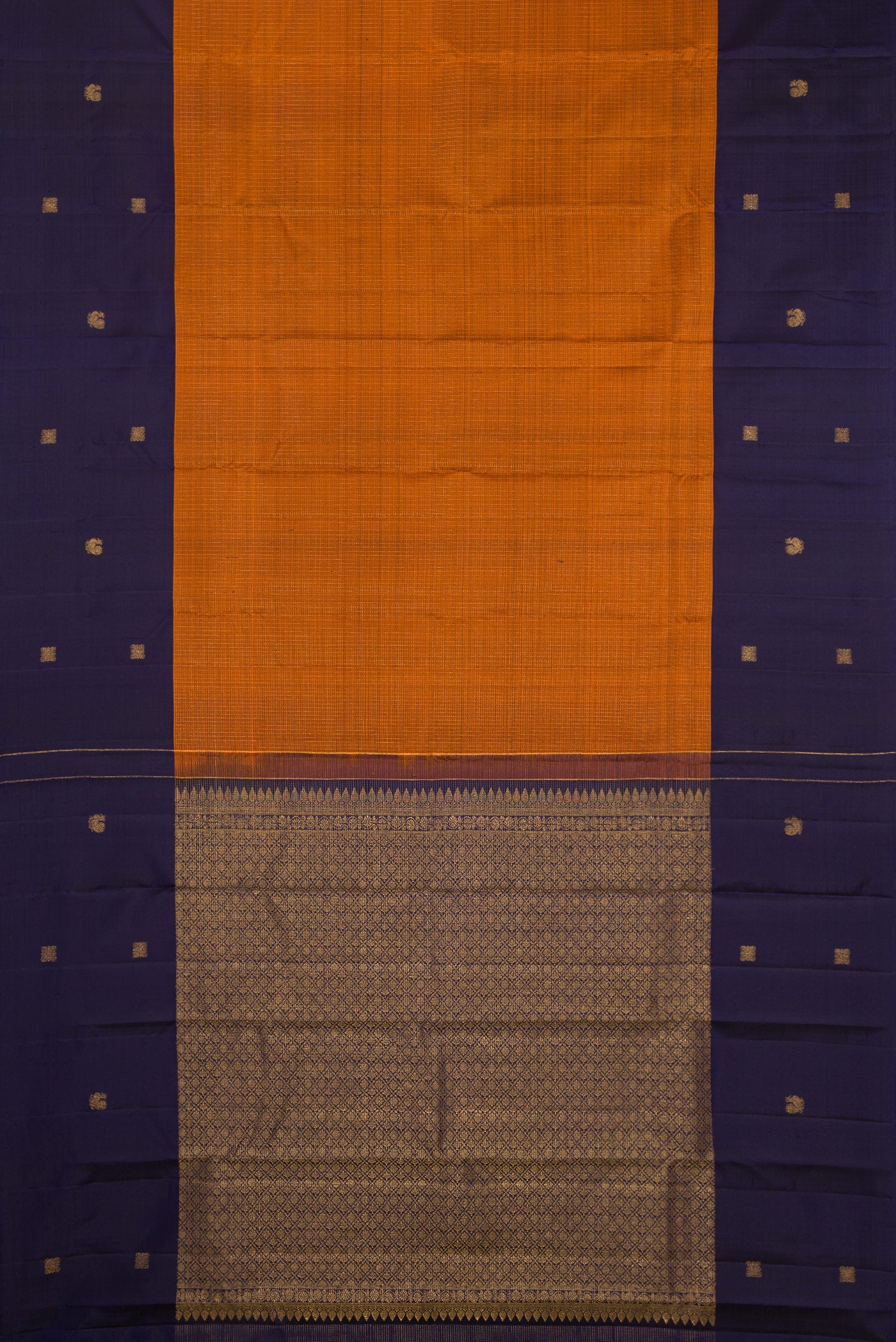 Flat view of Rust Kanjivaram Silk Saree with Checked design on the body and Fancy Border. 
