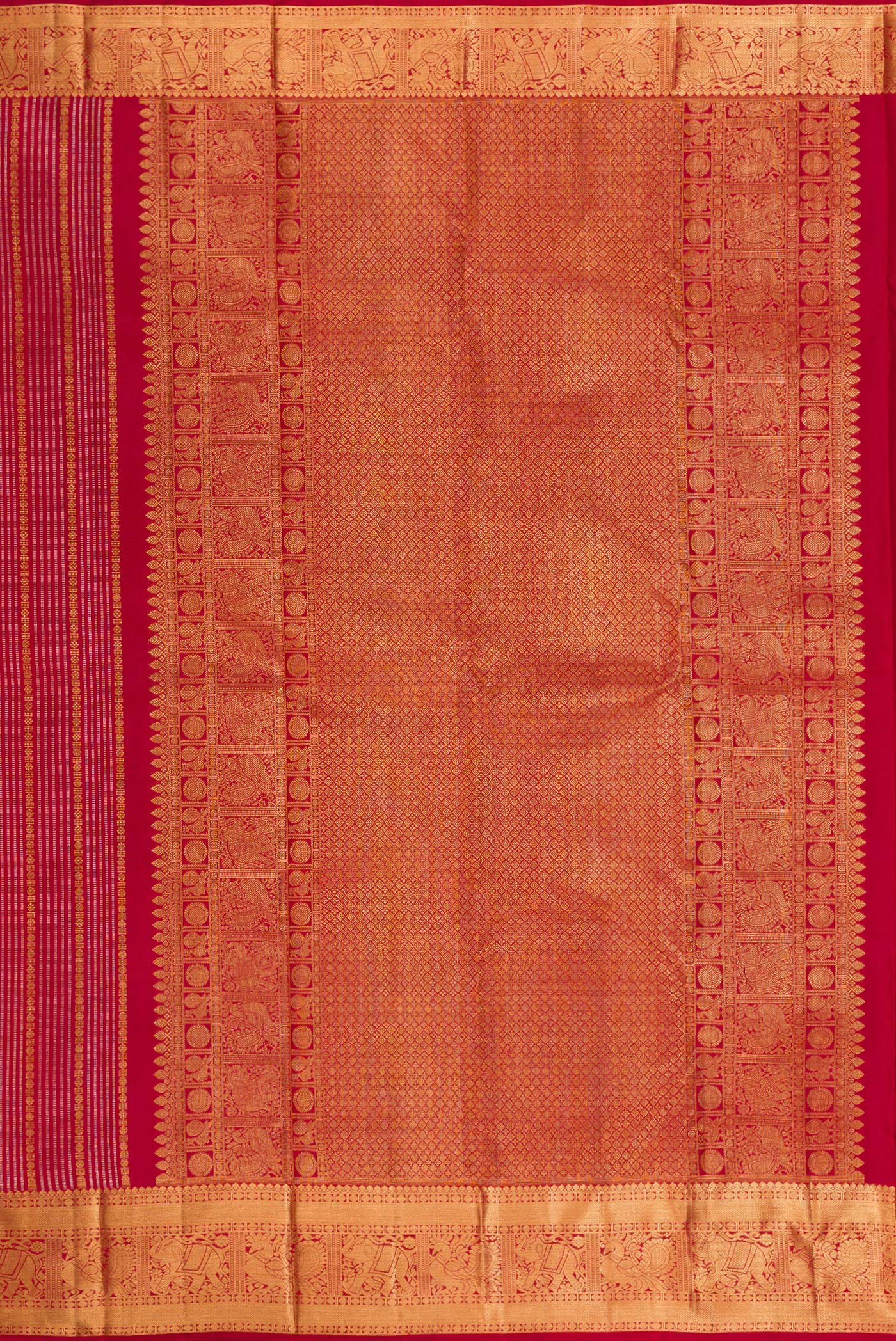 Close up image of the pallu of Maroon Kanjivaram Silk Saree with Stripes on the body and Zari Border. 