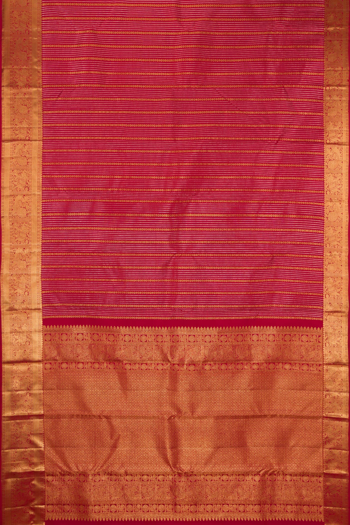 Flat view of Maroon Kanjivaram Silk Saree with Stripes on the body and Zari Border. 