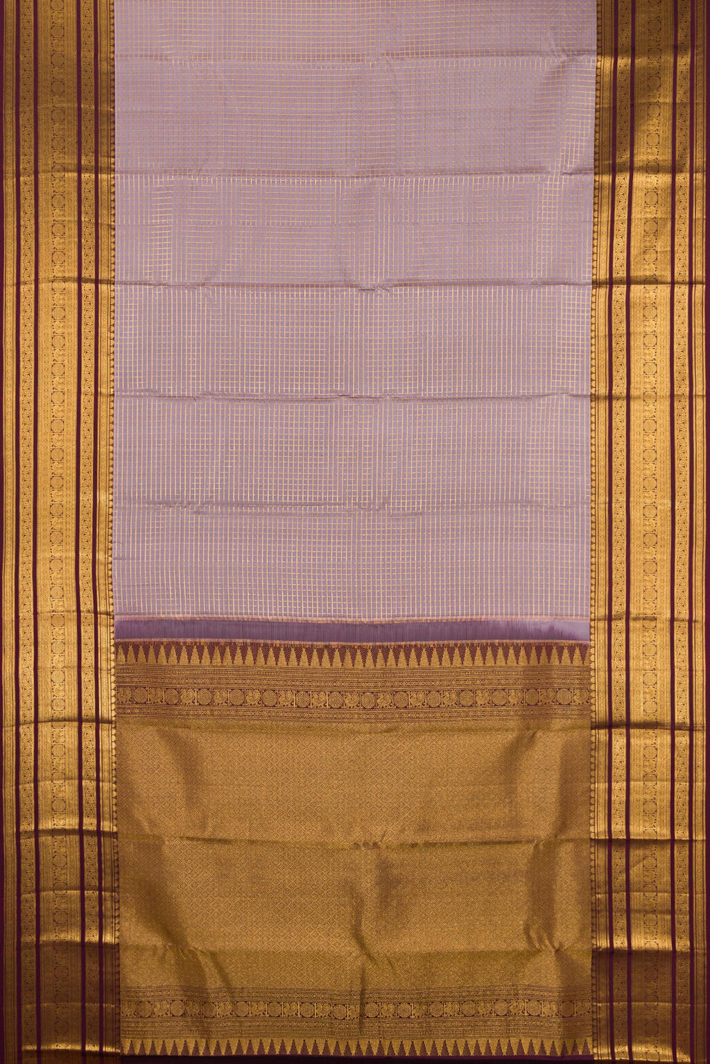 Flat view of Lavender Dual Tone Kanjivaram Silk Saree with Checked design on the body and Zari Border. 