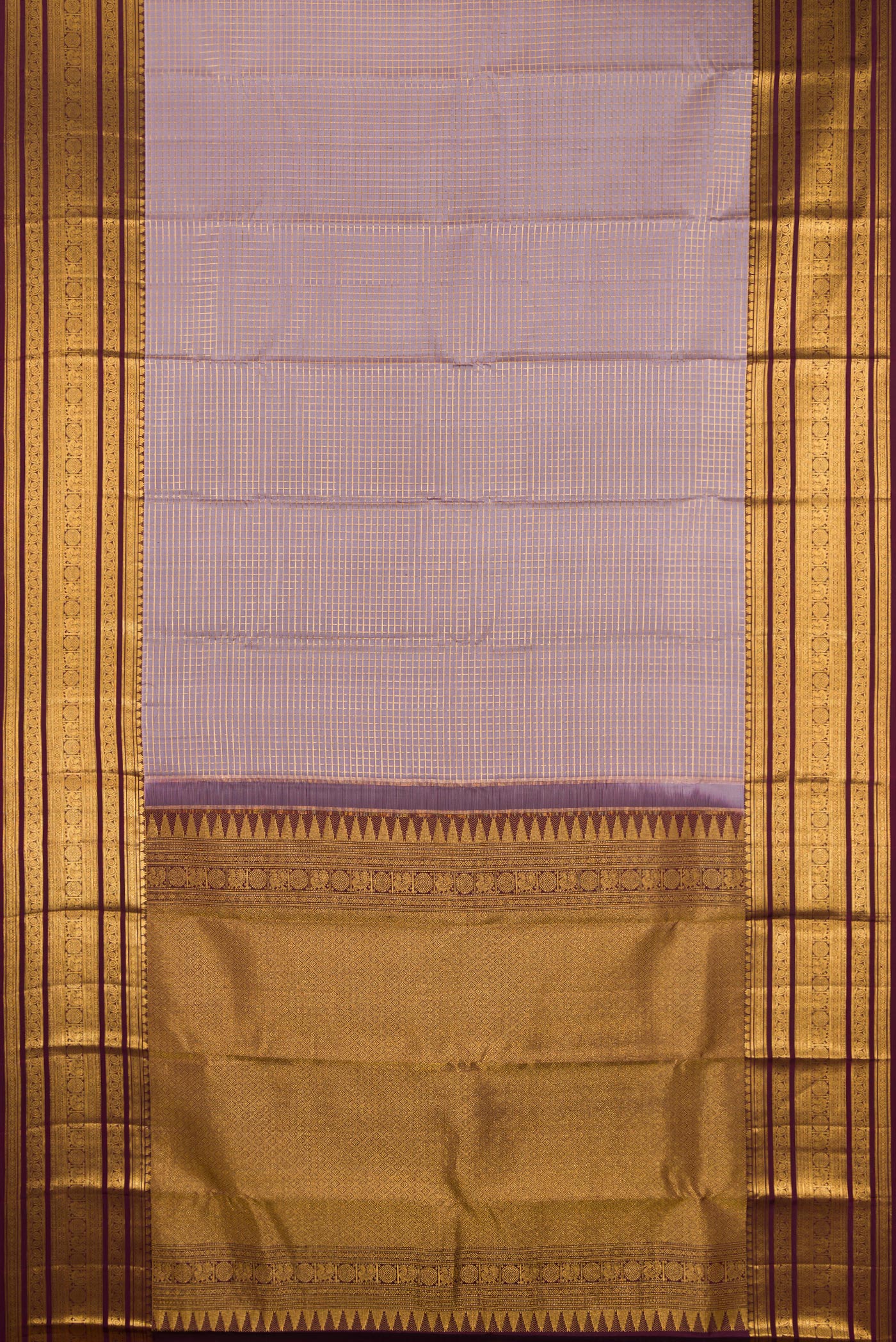 Flat view of Lavender Dual Tone Kanjivaram Silk Saree with Checked design on the body and Zari Border. 