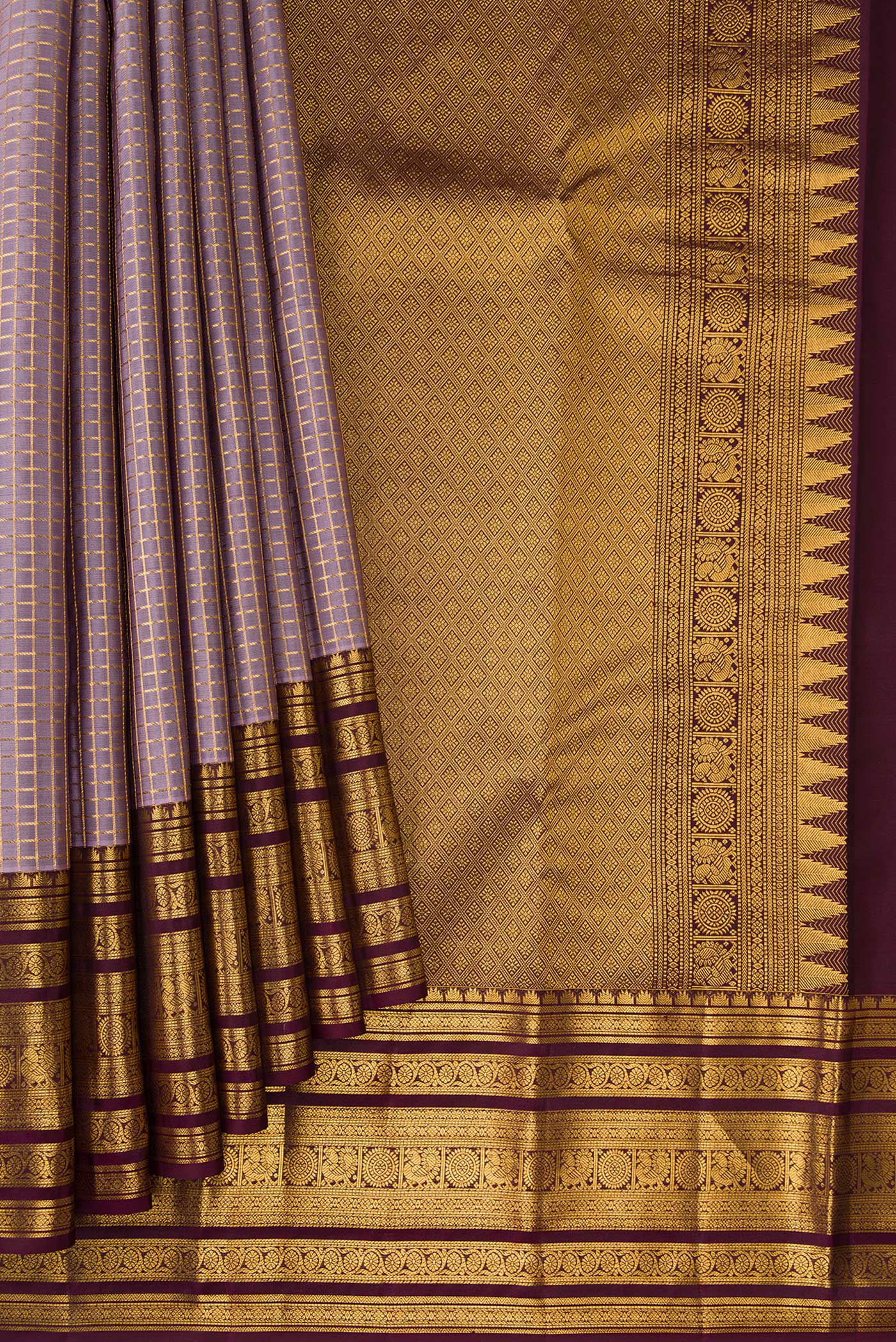 Pleats and pallu of Lavender Dual Tone Kanjivaram Silk Saree with Checked design on the body and Zari Border. 