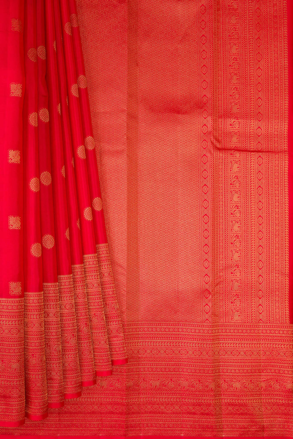Pleats and pallu of Red Kanchipuram Silk Saree with Zari Butta on the body and Fancy Border. 