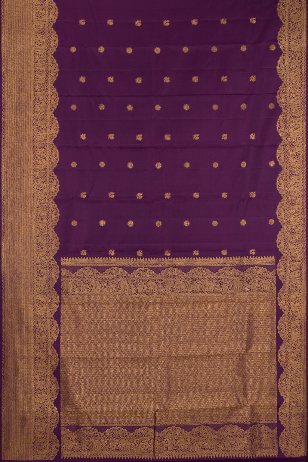 Flat view of Burgundy Kanchipuram Silk Saree with Zari Butta on the body and Fancy Border. 