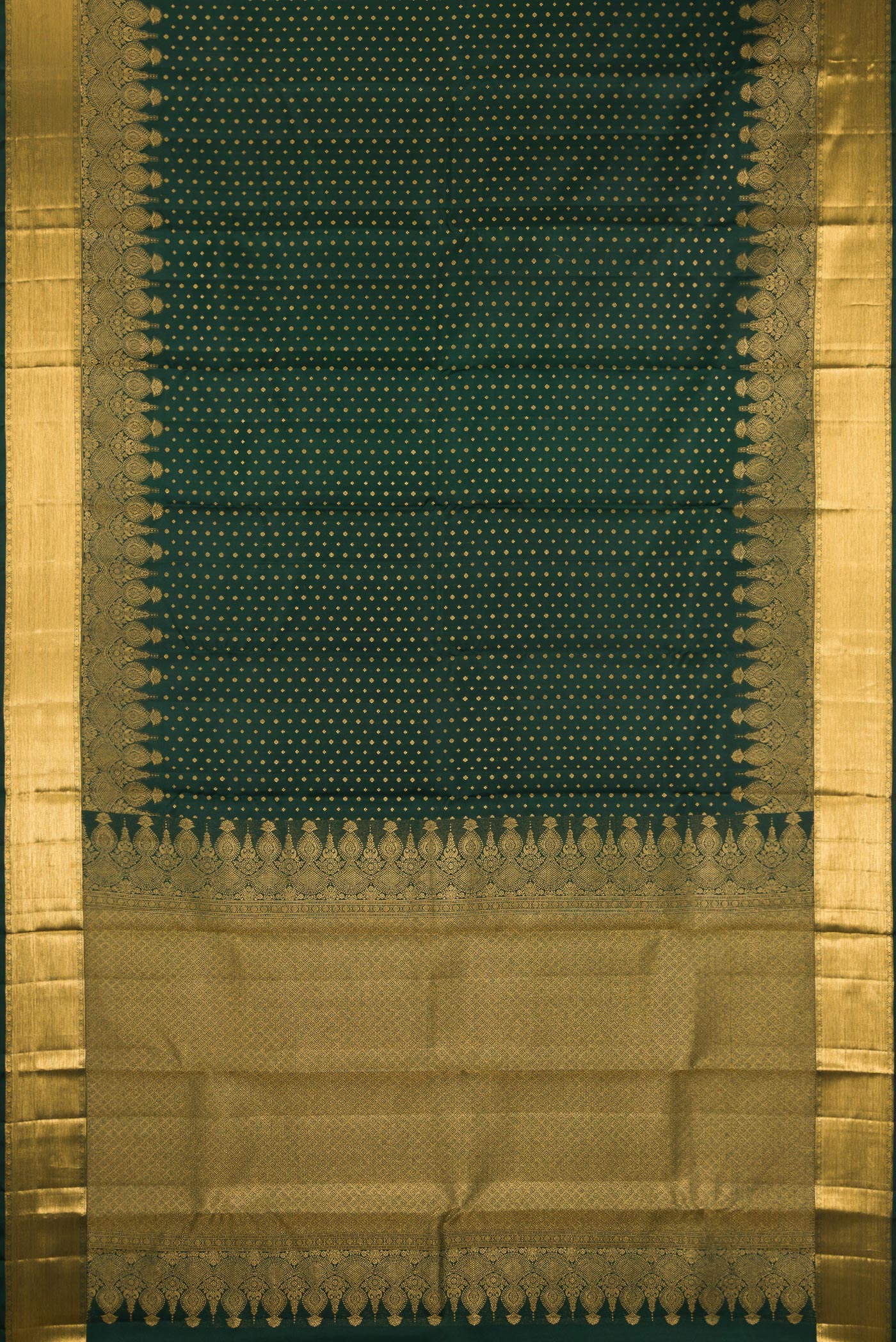Flat view of Bottle Green Kanjivaram Silk Saree with Zari Butta on the body and Fancy Border. 