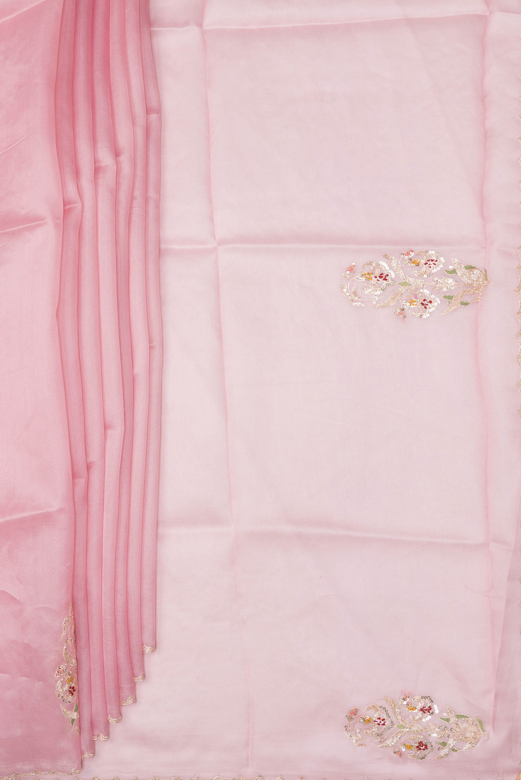 Pleats and pallu of Pink Dual Tone Organza Saree with Embroidery on the body and Embroidery Border. 
