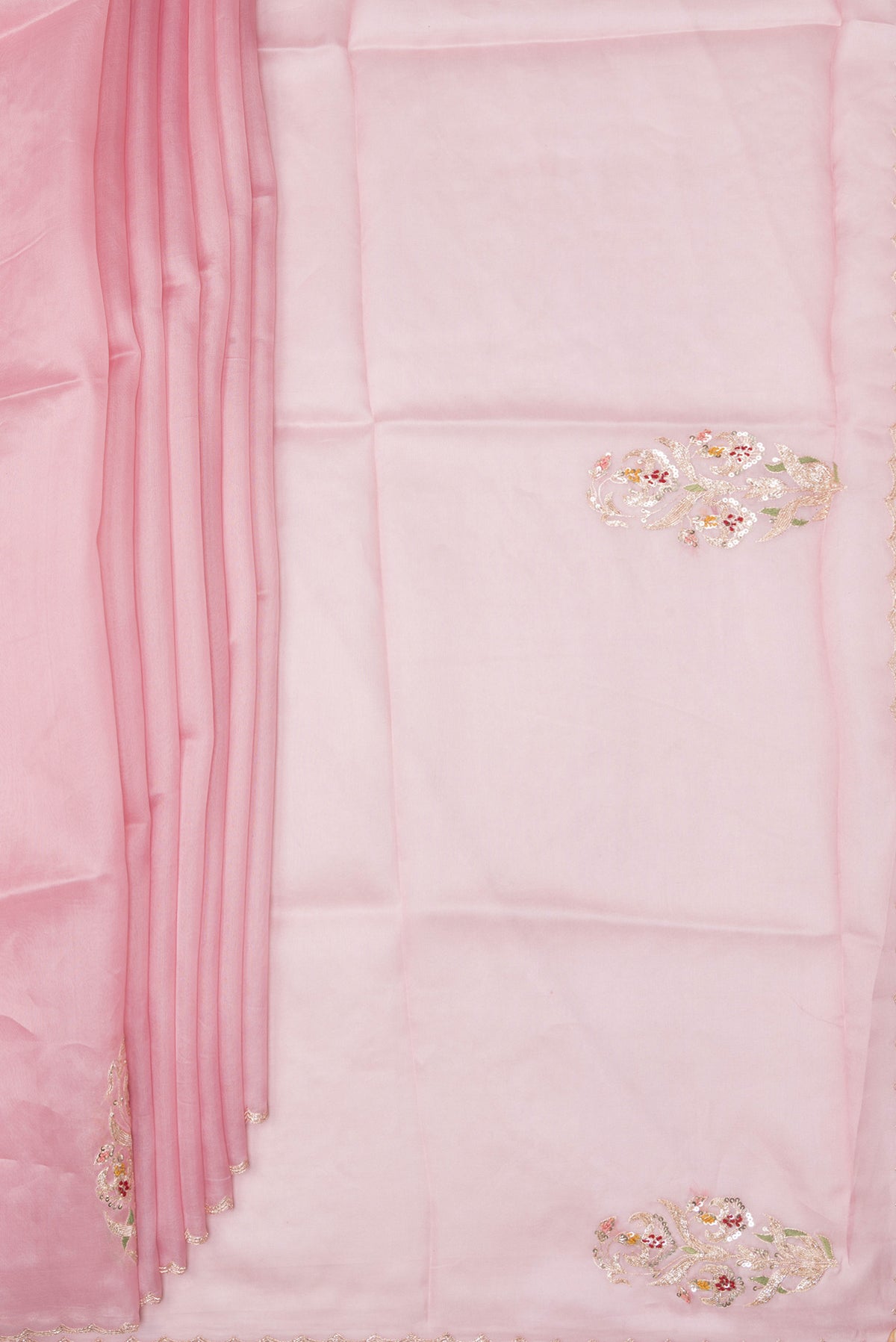 Pleats and pallu of Pink Dual Tone Organza Saree with Embroidery on the body and Embroidery Border. 