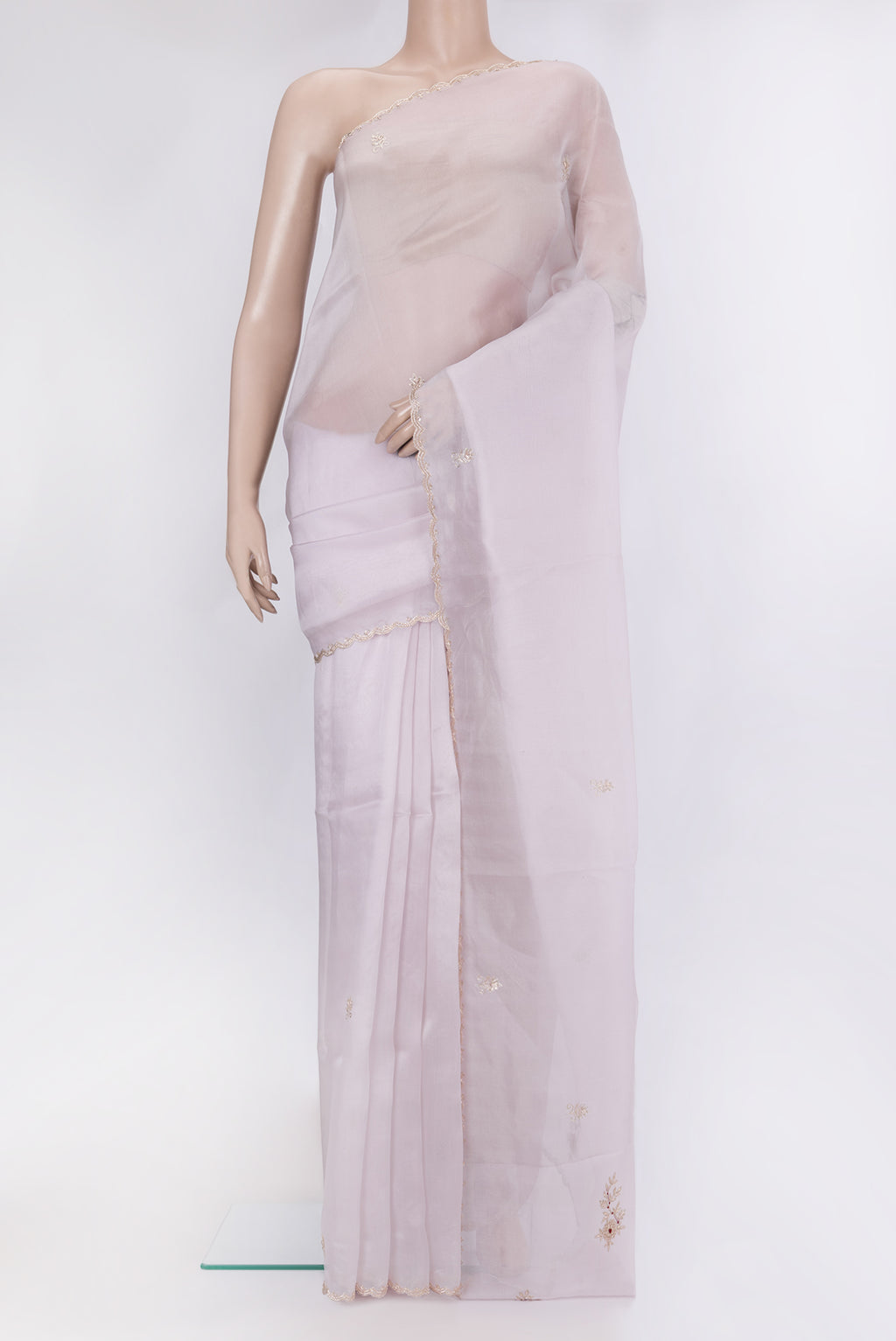 Lilac Organza Silk Saree with Embroidery on the body and Embroidery Border.  displayed on a mannequin