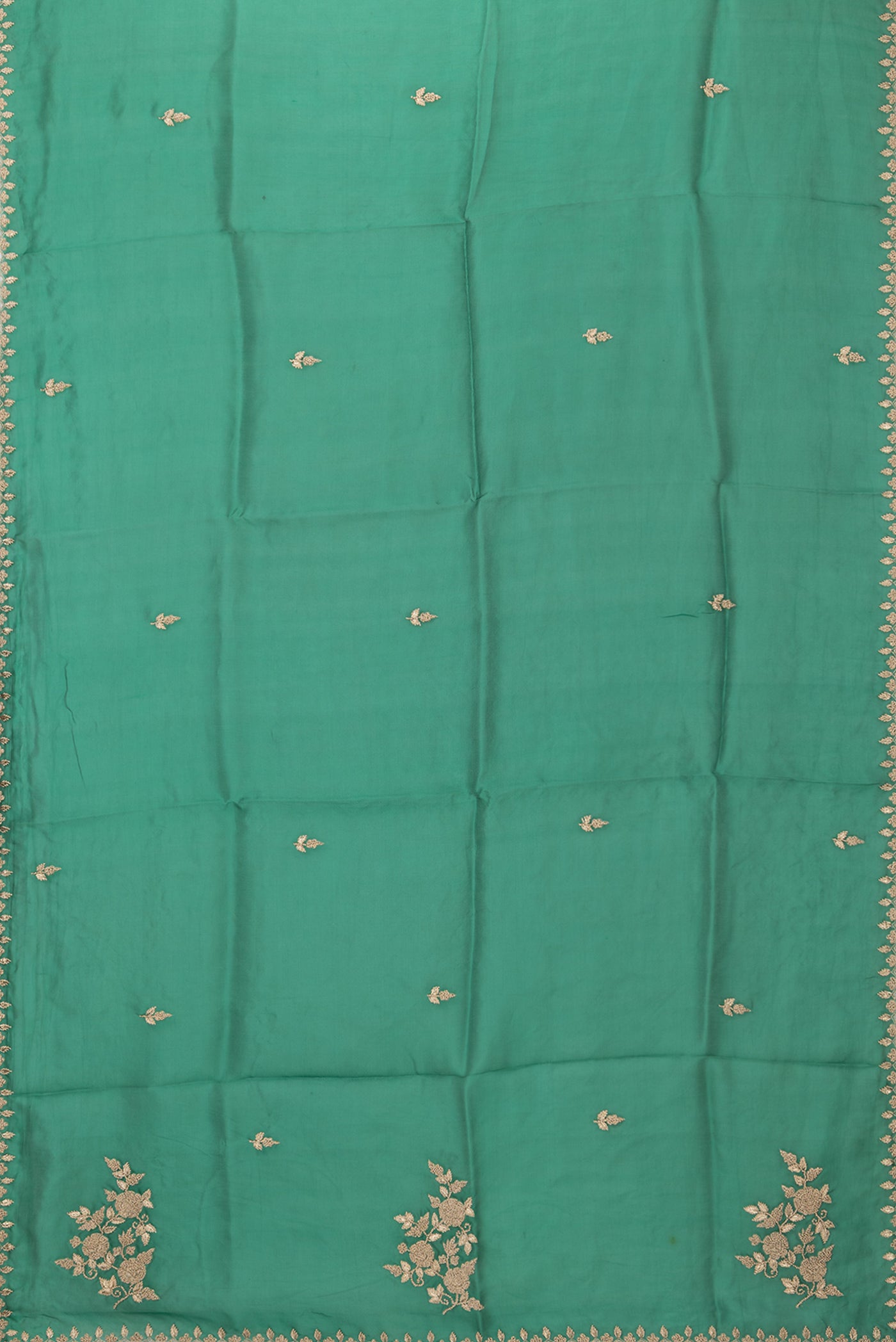 Flat view of Green Organza Silk Saree with Embroidery on the body and Embroidery Border. 