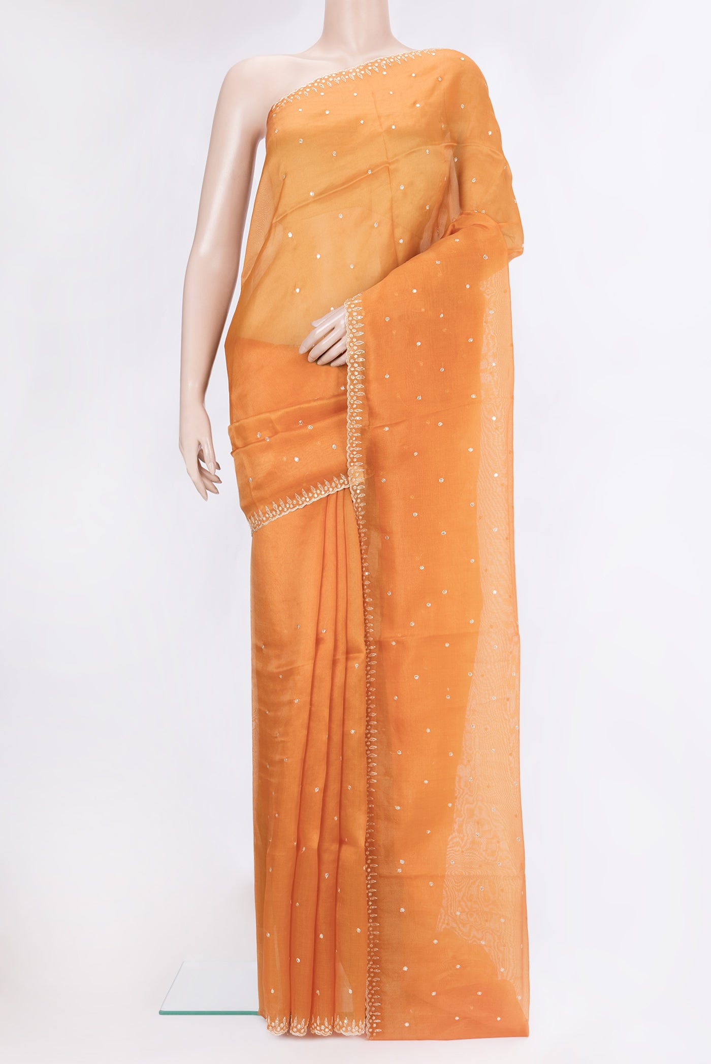 Orange Dual Tone Organza Silk Saree with Embroidery on the body and Embroidery Border.  displayed on a mannequin