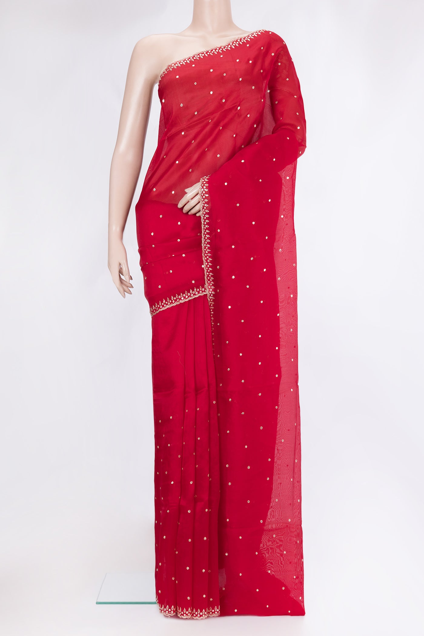Deep Red Organza Silk Saree with Embroidery on the body and Embroidery Border.  displayed on a mannequin