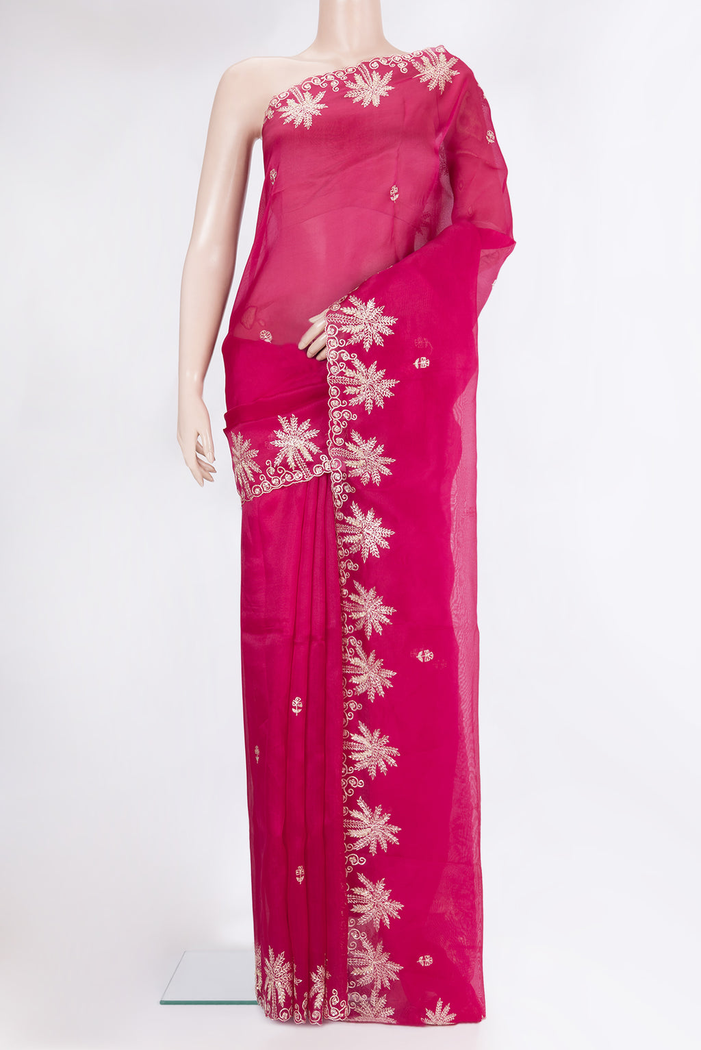 Dark Pink Organza Silk Saree with Embroidery on the body and Embroidery Border.  displayed on a mannequin