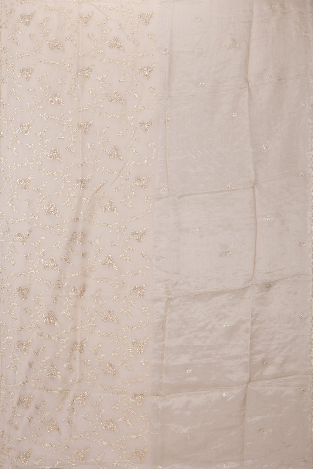 Flat view of Golden Peach Organza Silk Saree with Embroidery on the body and Embroidery Border. 