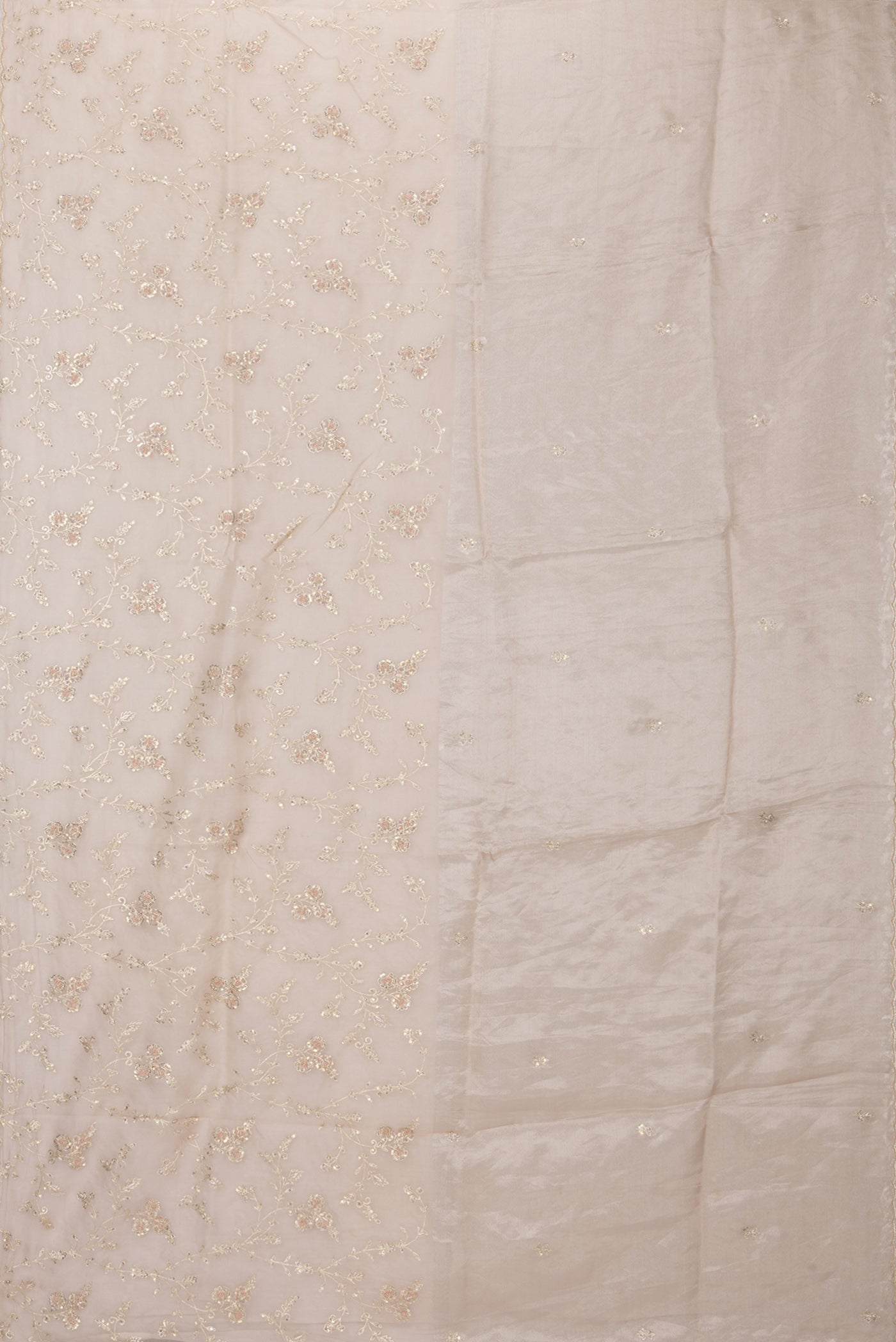 Flat view of Golden Peach Organza Silk Saree with Embroidery on the body and Embroidery Border. 