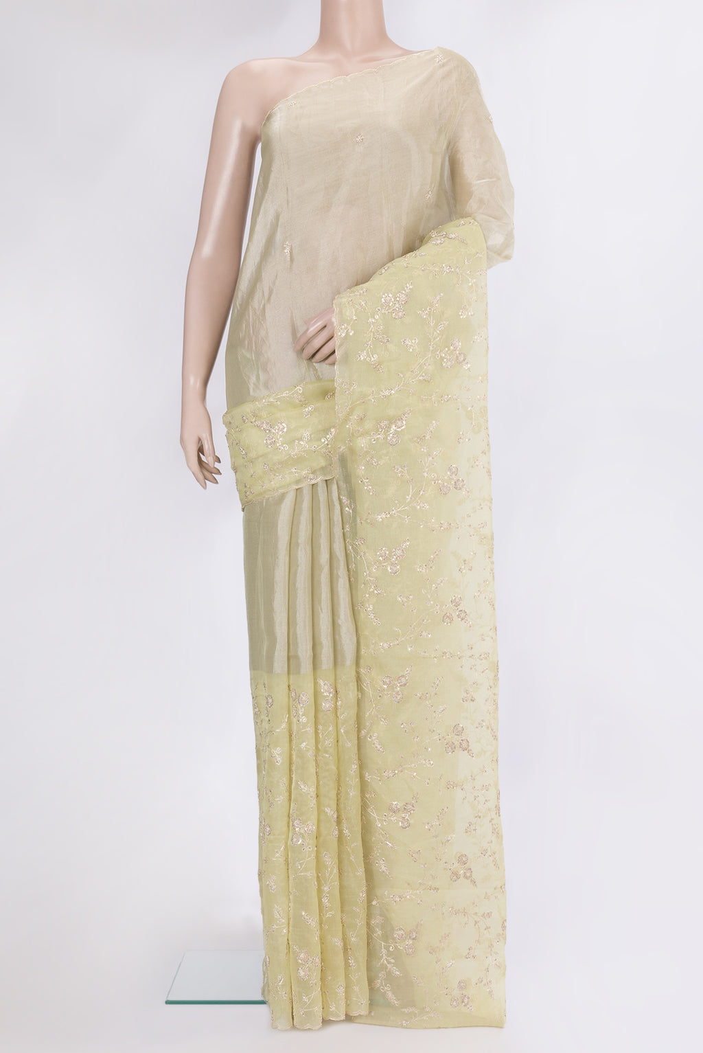 Lemon Yellow Organza Silk Saree with Embroidery on the body and Embroidery Border.  displayed on a mannequin